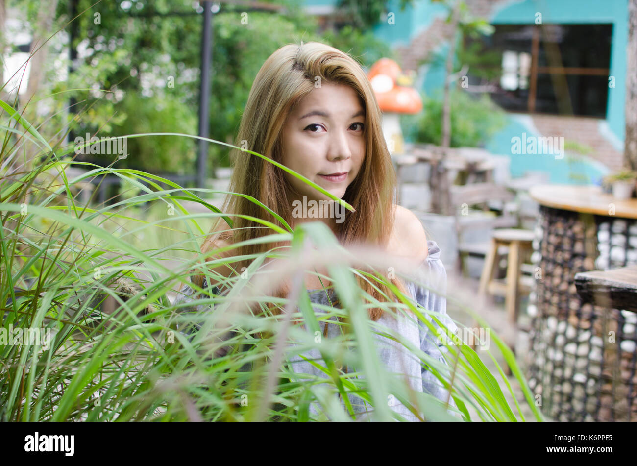 A portrait of a beautiful asian woman outdoor Stock Photo - Alamy