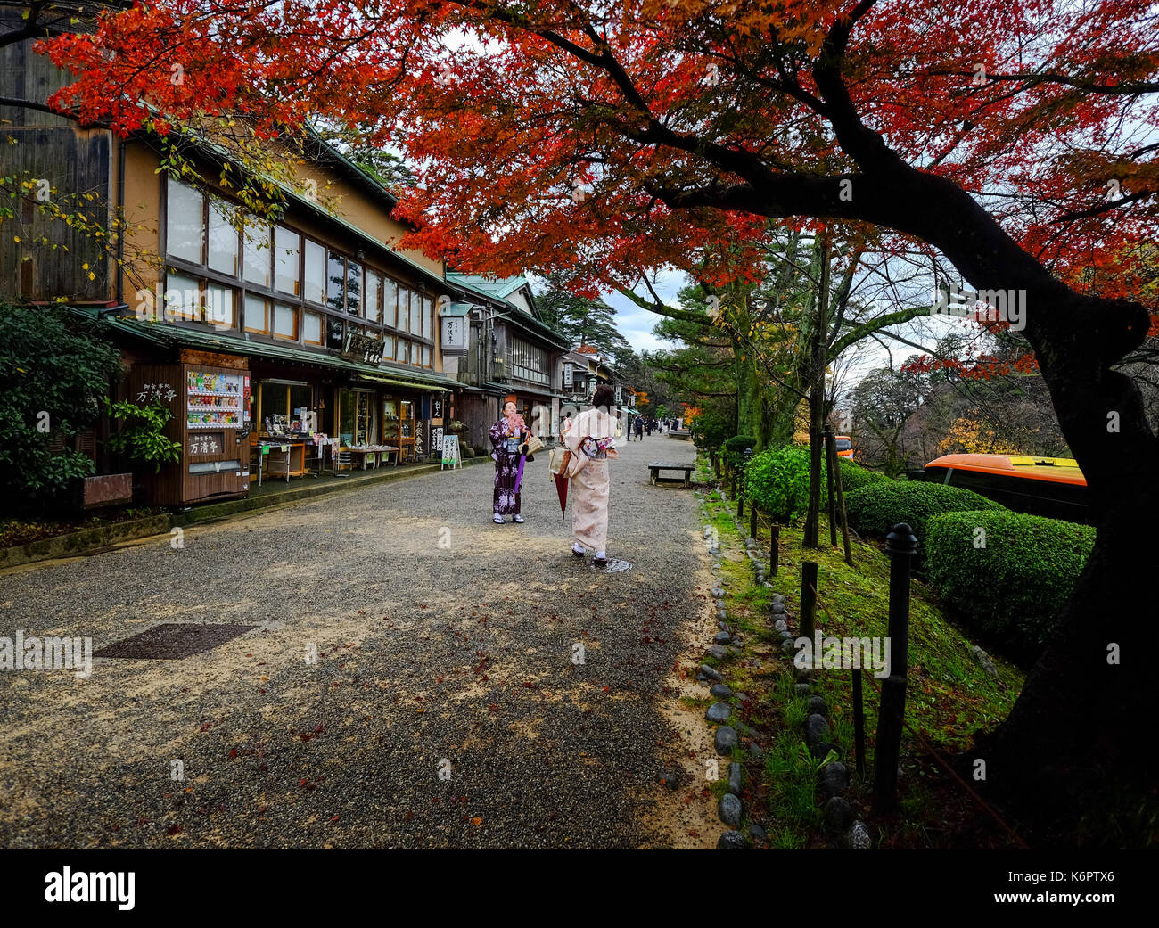 Kyoto, Japan - Nov 19, 2016. Women in kimono visit Gion Old Street in Kyoto, Japan. Kyoto served as Japan capital and the emperor residence from 794 u Stock Photo