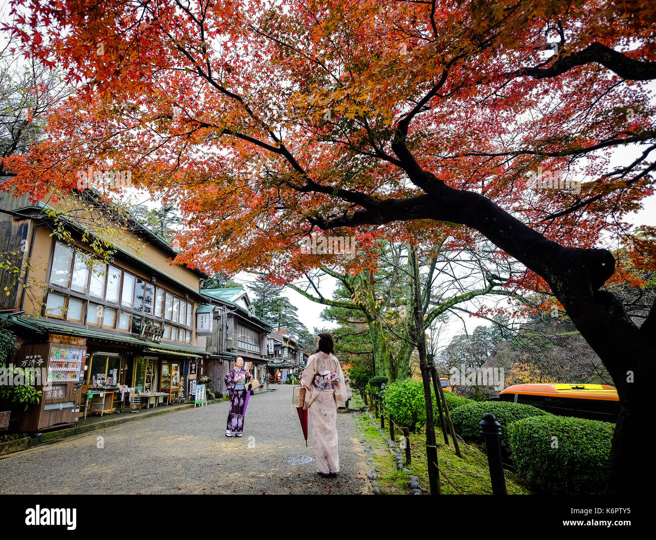 Kyoto, Japan - Nov 19, 2016. Women in kimono visit Gion Old Street at autumn in Kyoto, Japan. Kyoto served as Japan capital and the emperor residence  Stock Photo