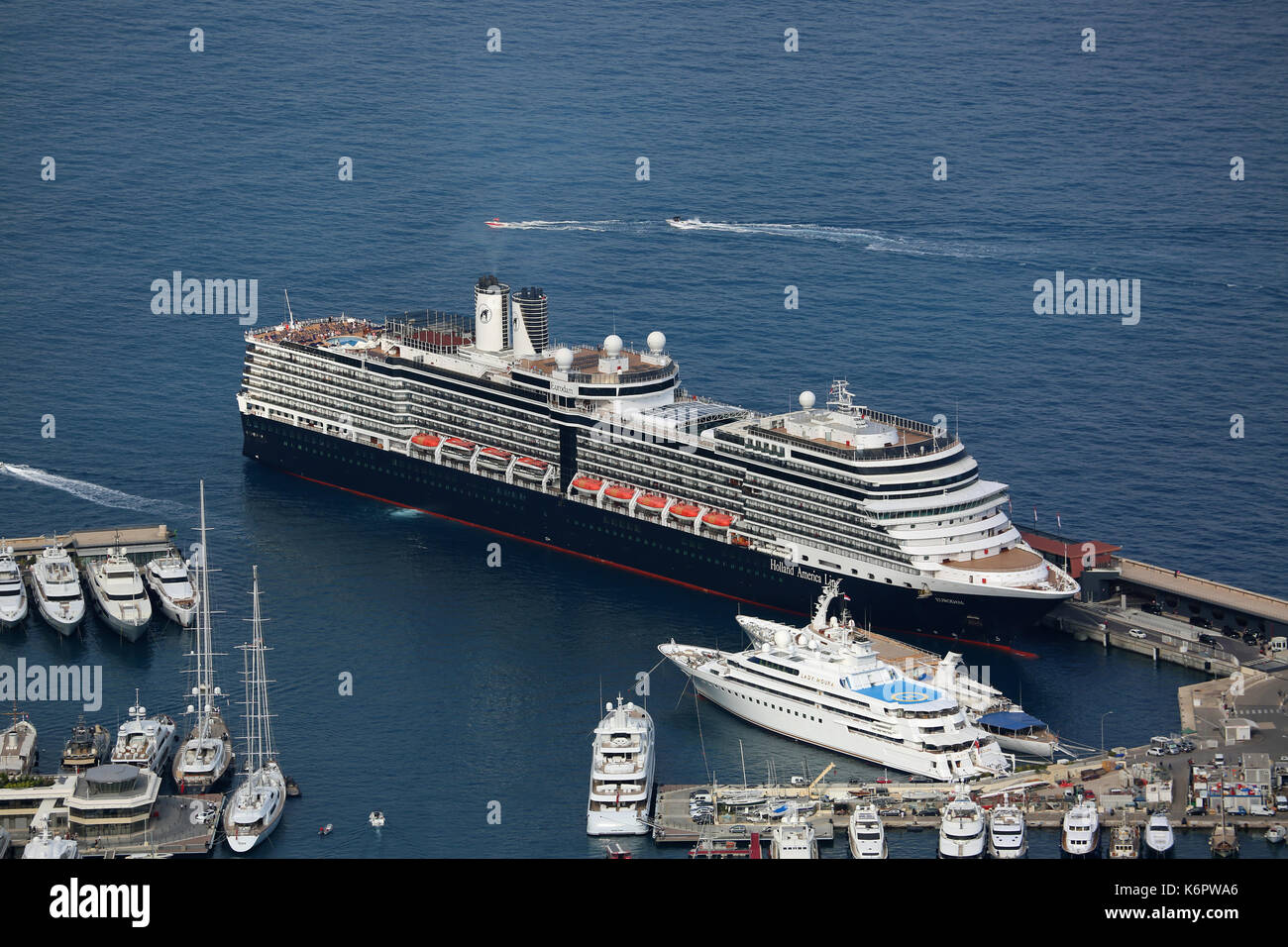 Monte-Carlo, Monaco - June 1, 2016: Aerial View of MS Eurodam Signature Cruise Ship (Holland America Line) and others Luxury Yachts in Port Hercule in Stock Photo