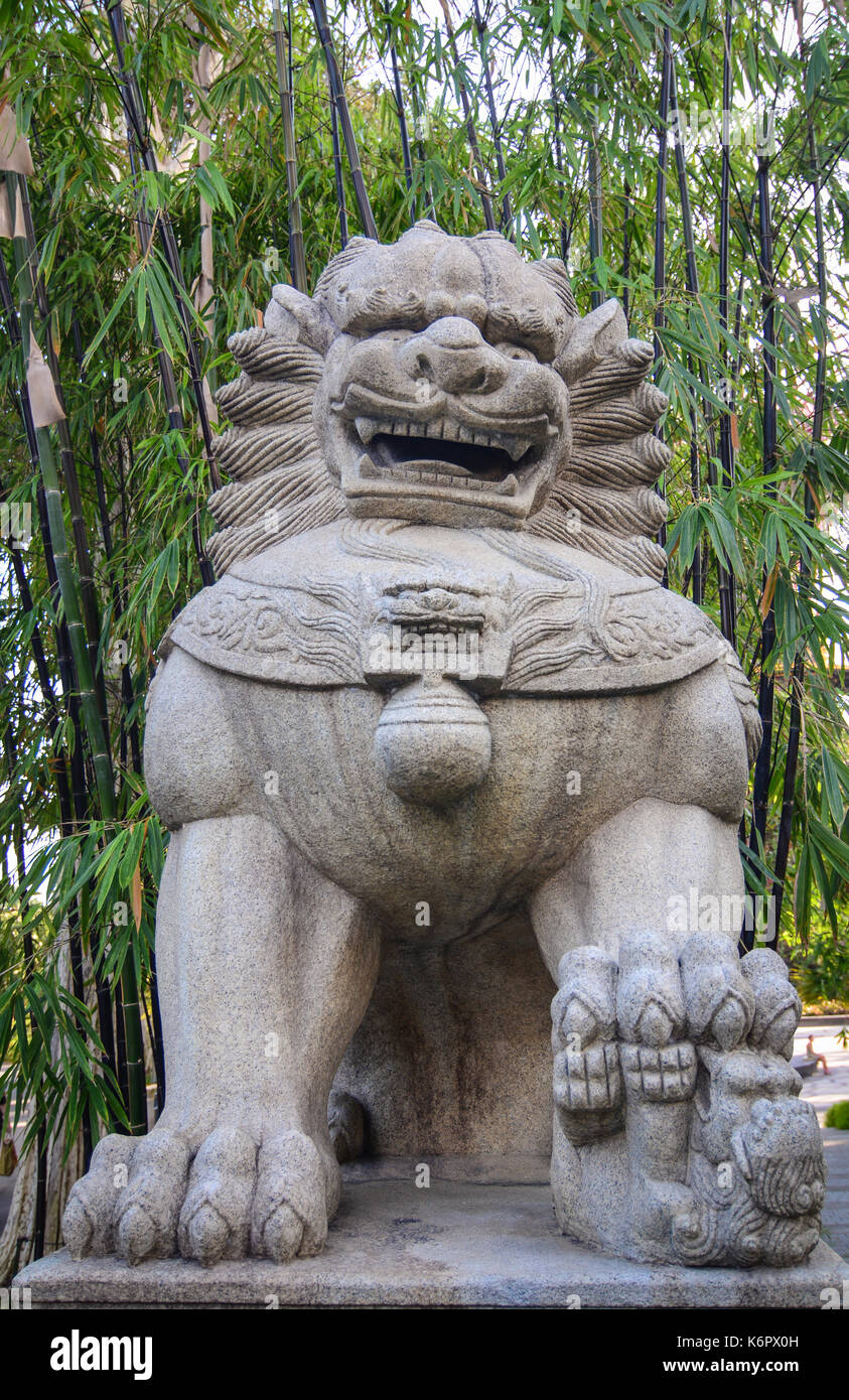 Chinese temple lion statue singapore hires stock photography and