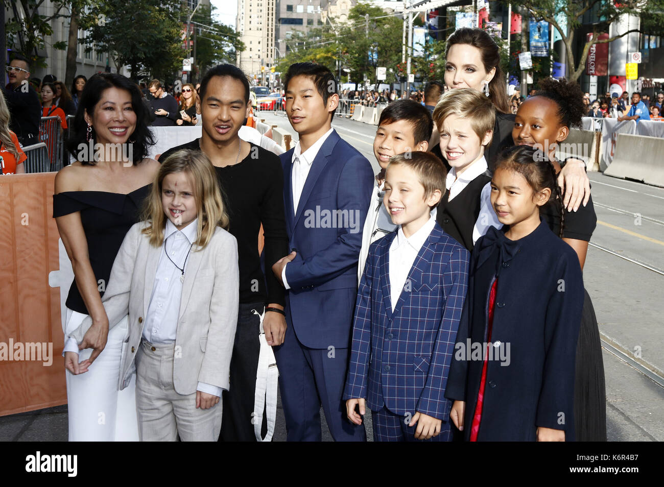 Toronto, Kanada. 11th Sep, 2017. Loung Ung, Vivienne Marcheline Jolie-Pitt, Maddox Jolie-Pitt, Pax Thien Jolie-Pitt, Kimhak Mun, Knox Leon Jolie-Pitt, Shiloh Jolie-Pitt, Angelina Jolie, Zahara Jolie-Pitt and Sareum Srey Moch attending the 'First They Killed My Father: A Daughter of Cambodia Remembers' premiere during the 42nd Toronto International Film Festival at Princess of Wales Theatre on September 11, 2017 in Toronto, Canada | Verwendung weltweit/picture alliance Credit: dpa/Alamy Live News Stock Photo