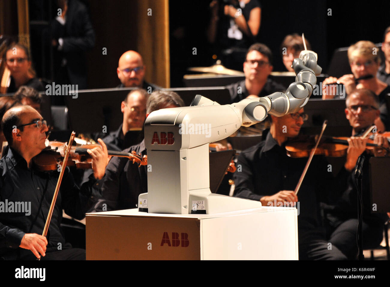 Bocelli sings with the orchestra conductor Robot 12/09/2017-Pisa-Italy  singing and robotics event In the Teatro Verdi of Pisa at the International Robotic  Festival, the evening at Teatro was dedicated to singing with