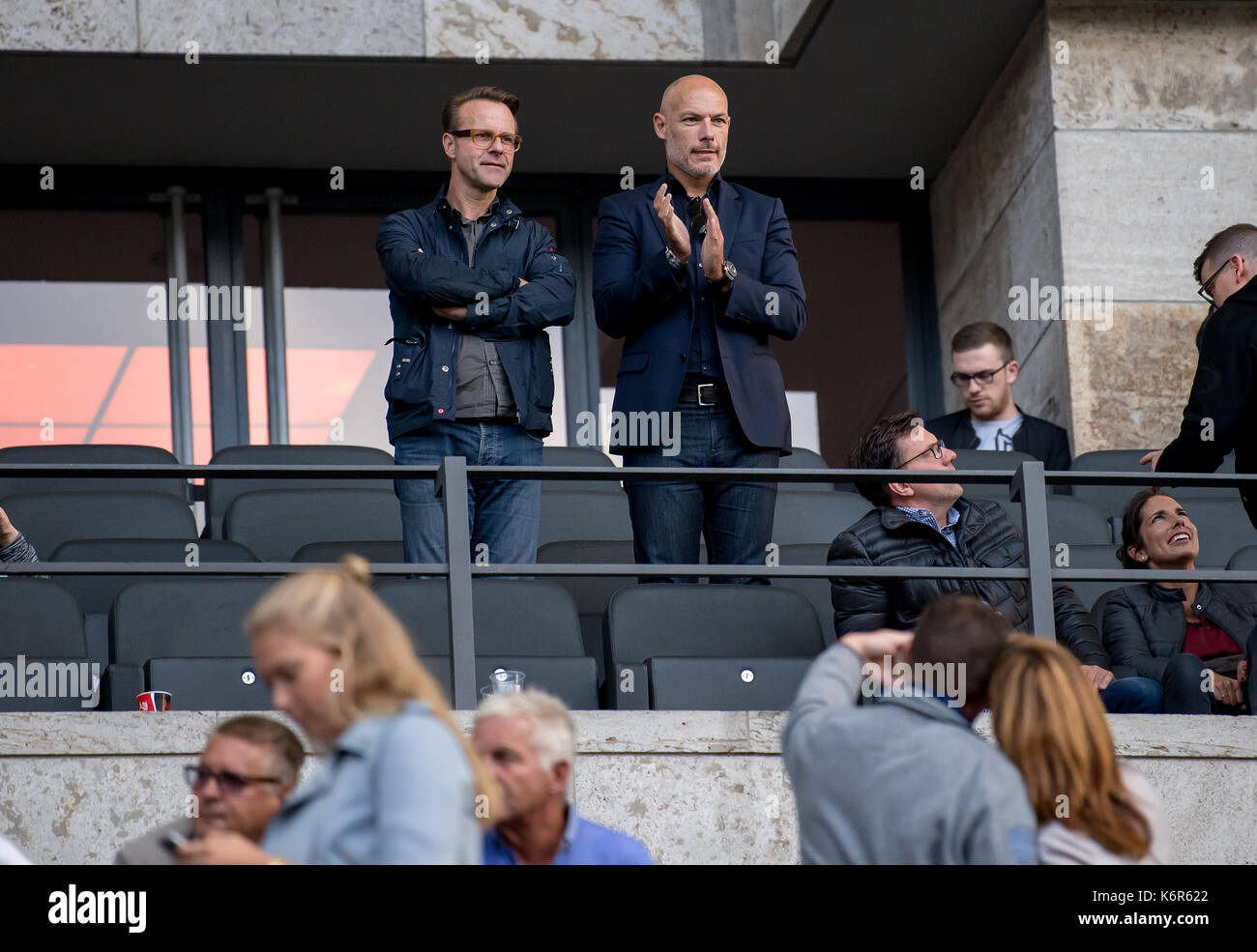 Berlin, Germany. 10th Sep, 2017. Referee Bibiana Steinhaus has her first Bundesliga match, her partner, the former British referee Howard Webb (C), watches from the stands during the German Bundesliga soccer match between Hertha BSC and Werder Bremen at the Olympia stadium in Berlin, Germany, 10 September 2017. Next to him former referee and Sky expert Peter Gagelmann can be seen. Photo: Thomas Eisenhuth/dpa-Zentralbild/ZB/dpa/Alamy Live News Stock Photo