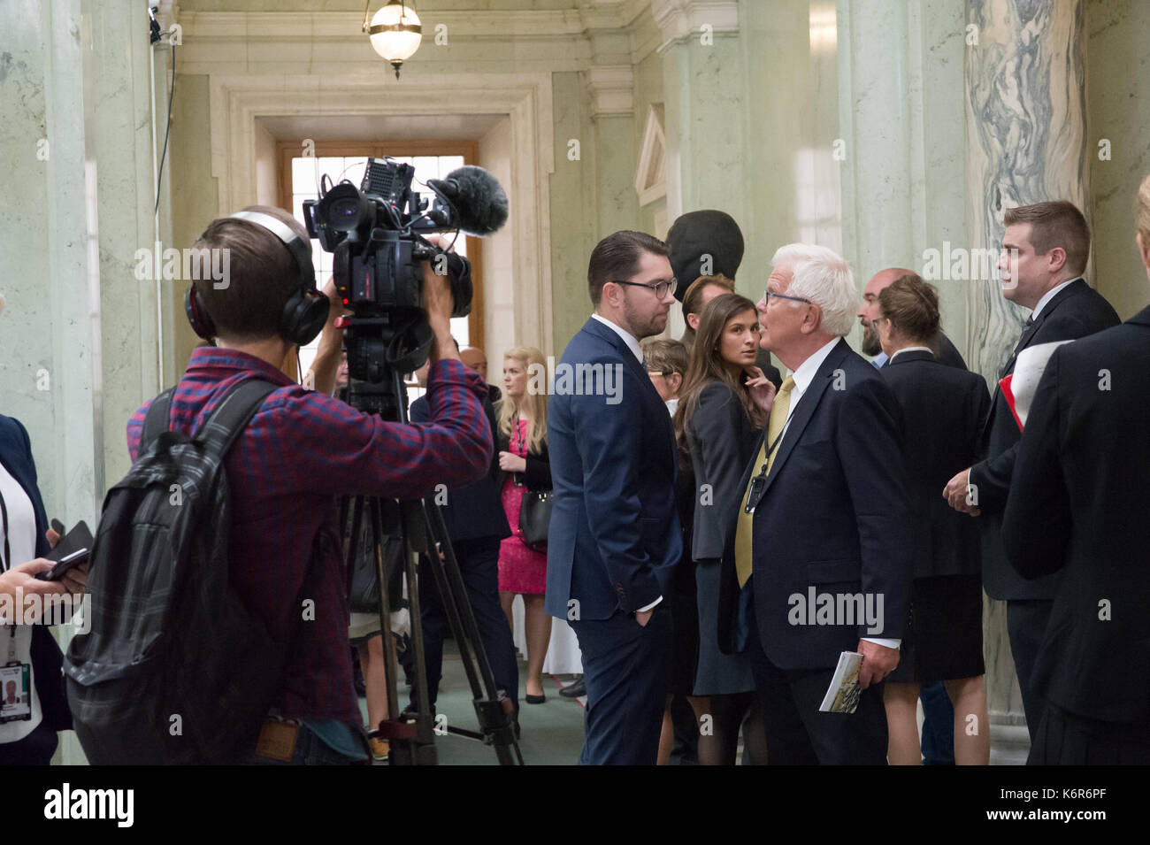 Stockholm, Sweden. 12th Sep, 2017. Opening of the Riksdag. Mingle and interviews after the session. Jimmie Akesson, (at the left) party leader (SD) and Alf Svensson, former party leader (KD). Credit: Barbro Bergfeldt/Alamy Live News Stock Photo