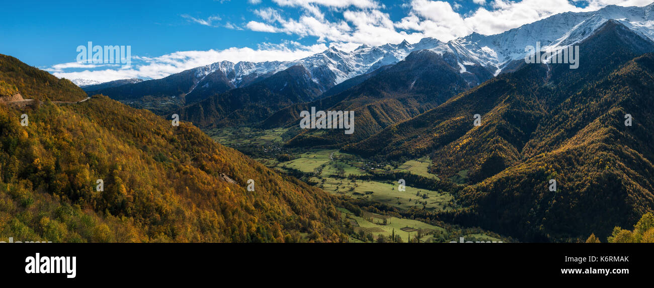 Panoramic view of Enguri river valley with small georgian villages among mountains of Svaneti Range in Upper Svaneti, nearby Mestia. Georgia Stock Photo