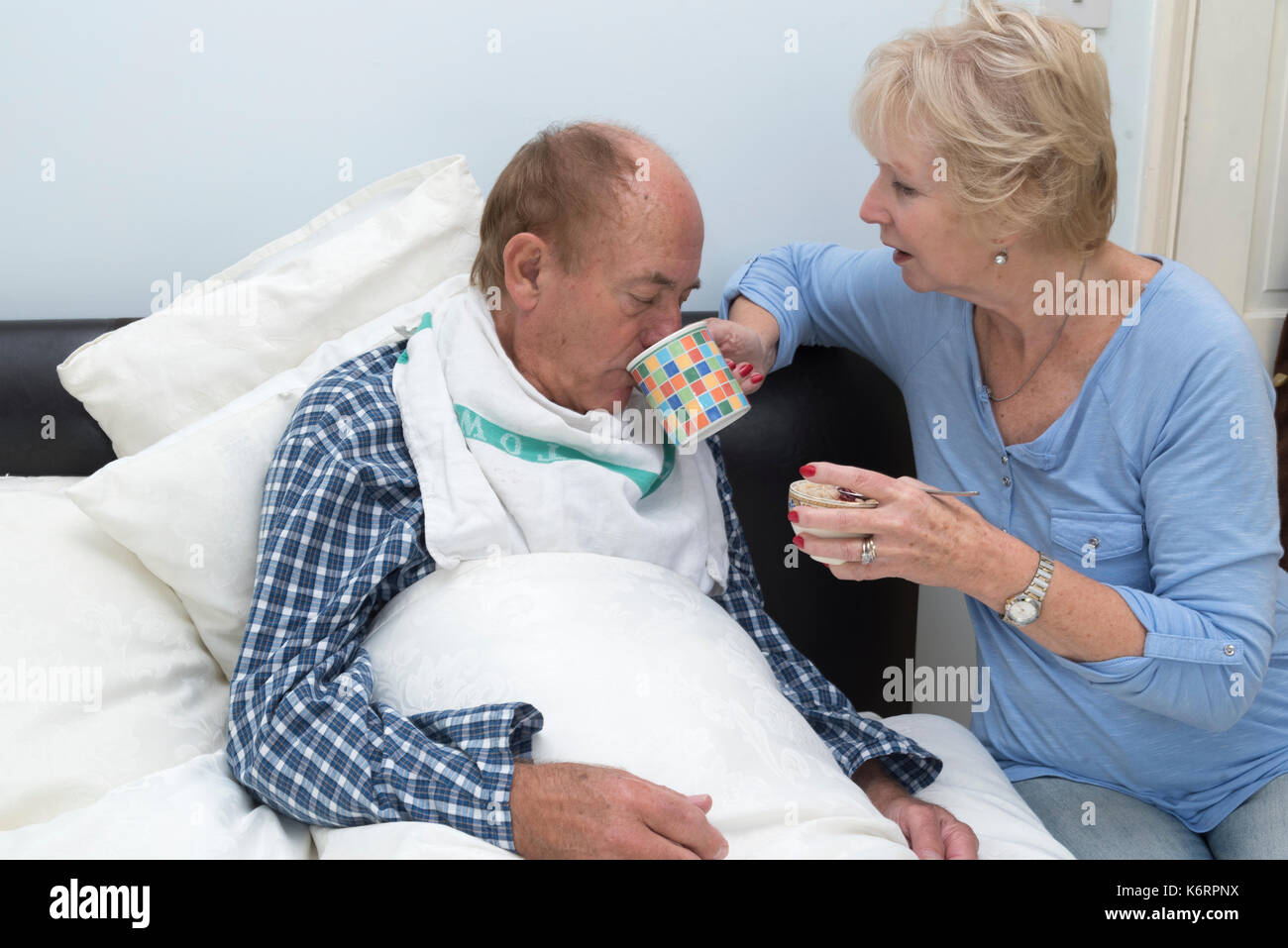 Feeding a bedridden patient hires stock photography and images Alamy