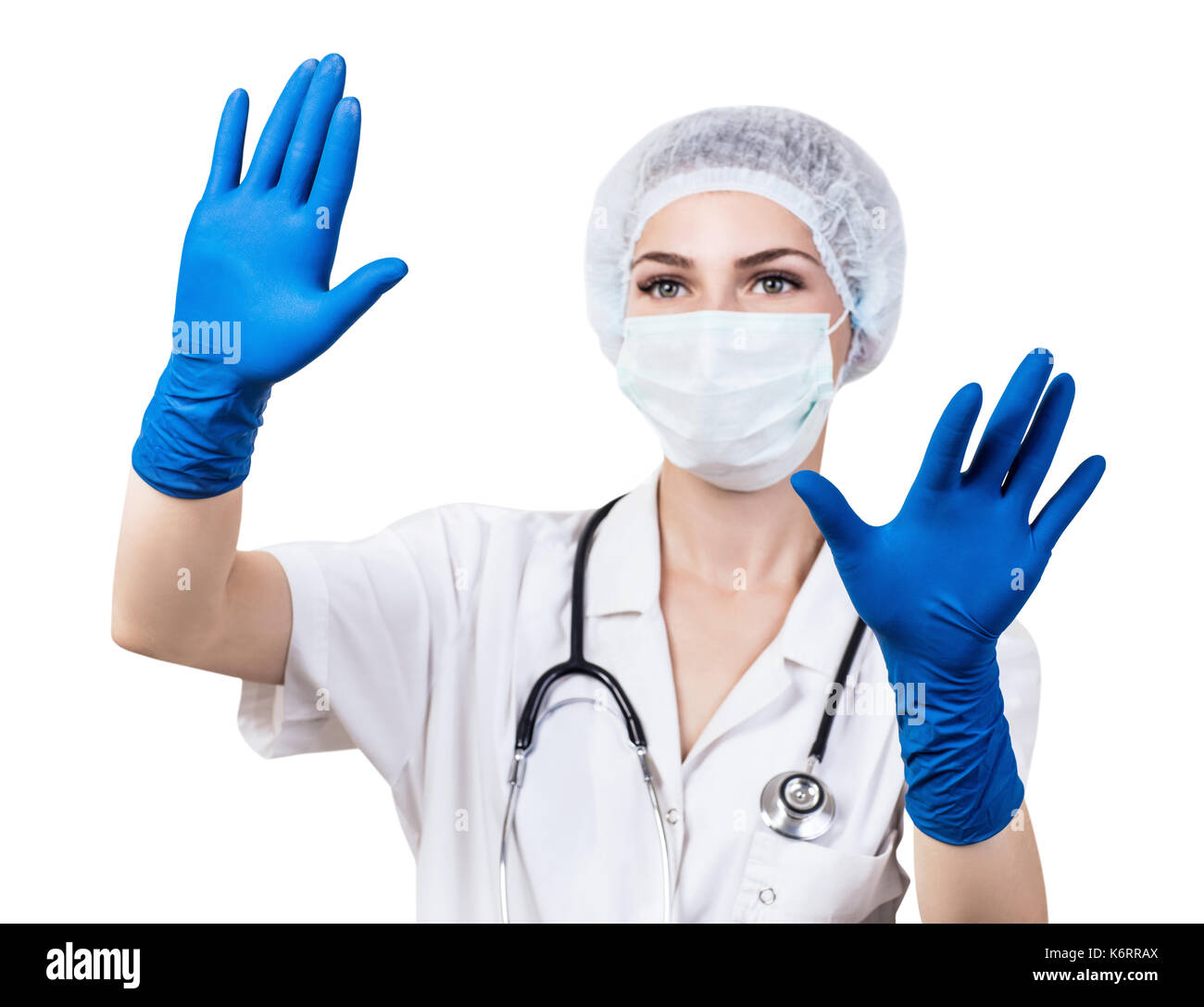 Woman doctor reaching for something in the air. Stock Photo