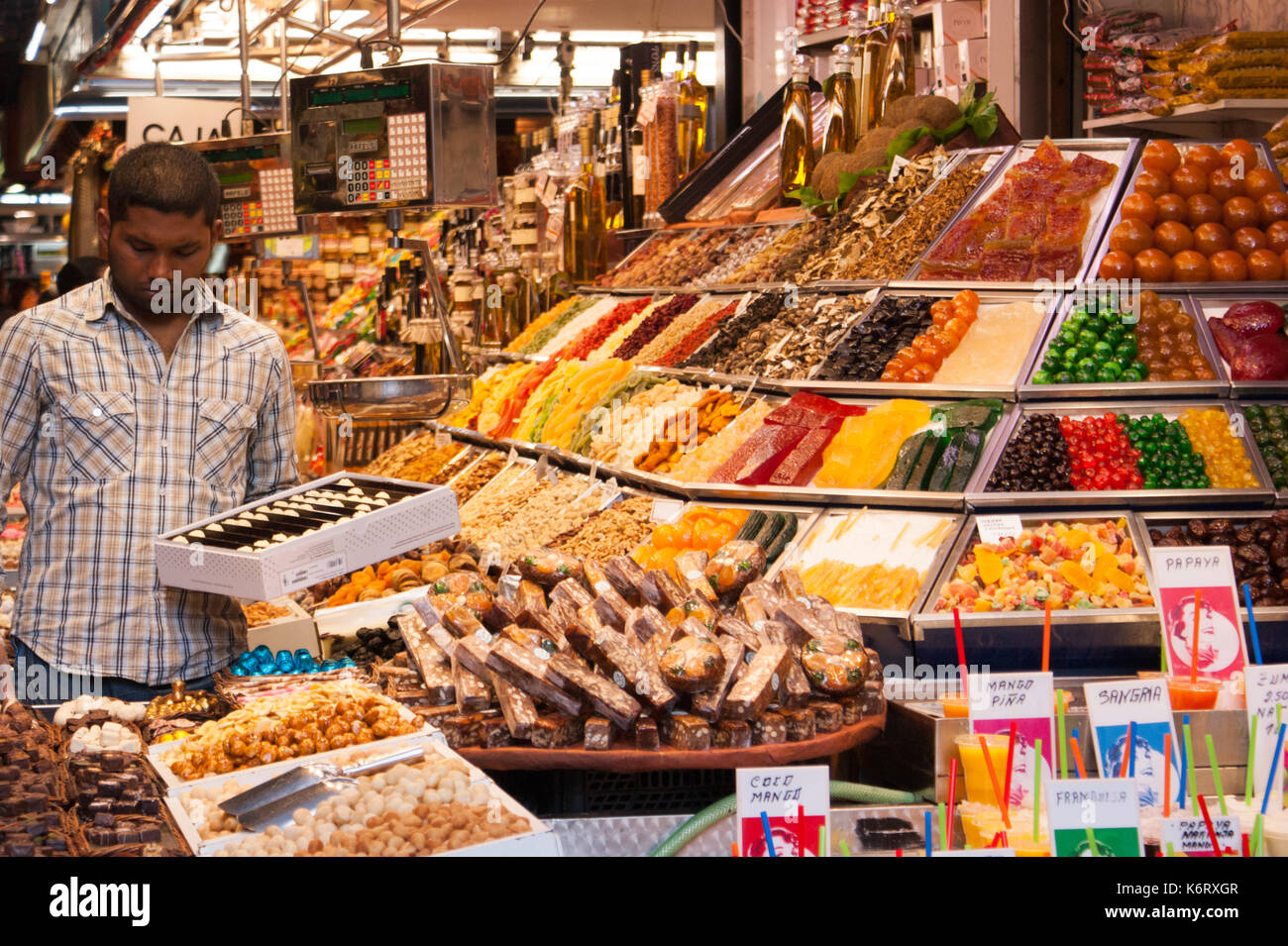 Fresh Food at La Bouqueria Market Barcelona Spain Confectionary and Glace fruits and chocolates Stock Photo