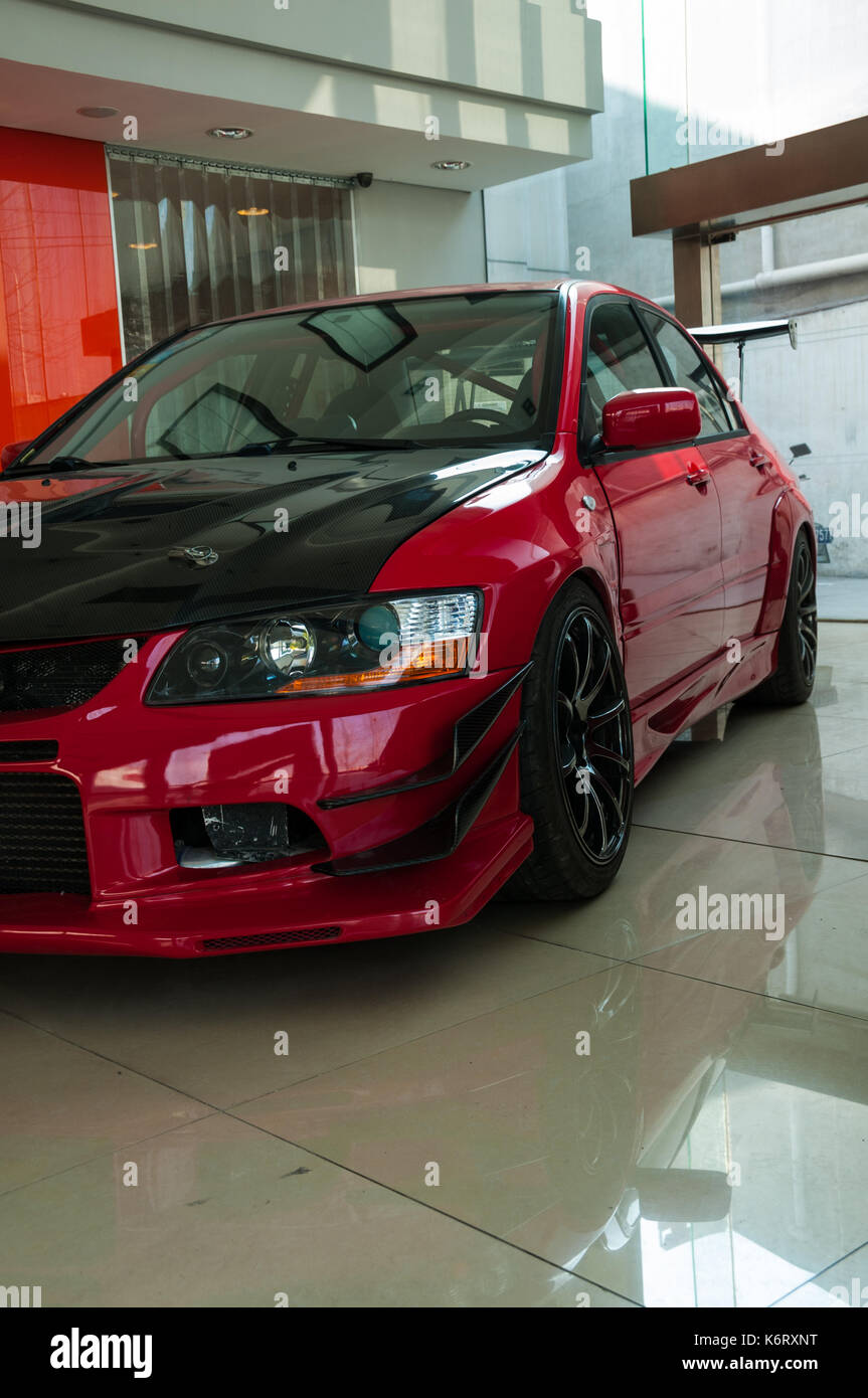 Mitsubishi Lancer Evo IX after modification in the showroom of U2 cars in  the Fengyiqiao area of Beijing Stock Photo - Alamy