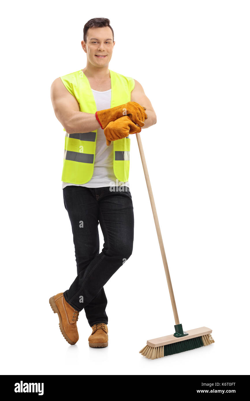 Full length portrait of a waste collector with a broom isolated on white background Stock Photo