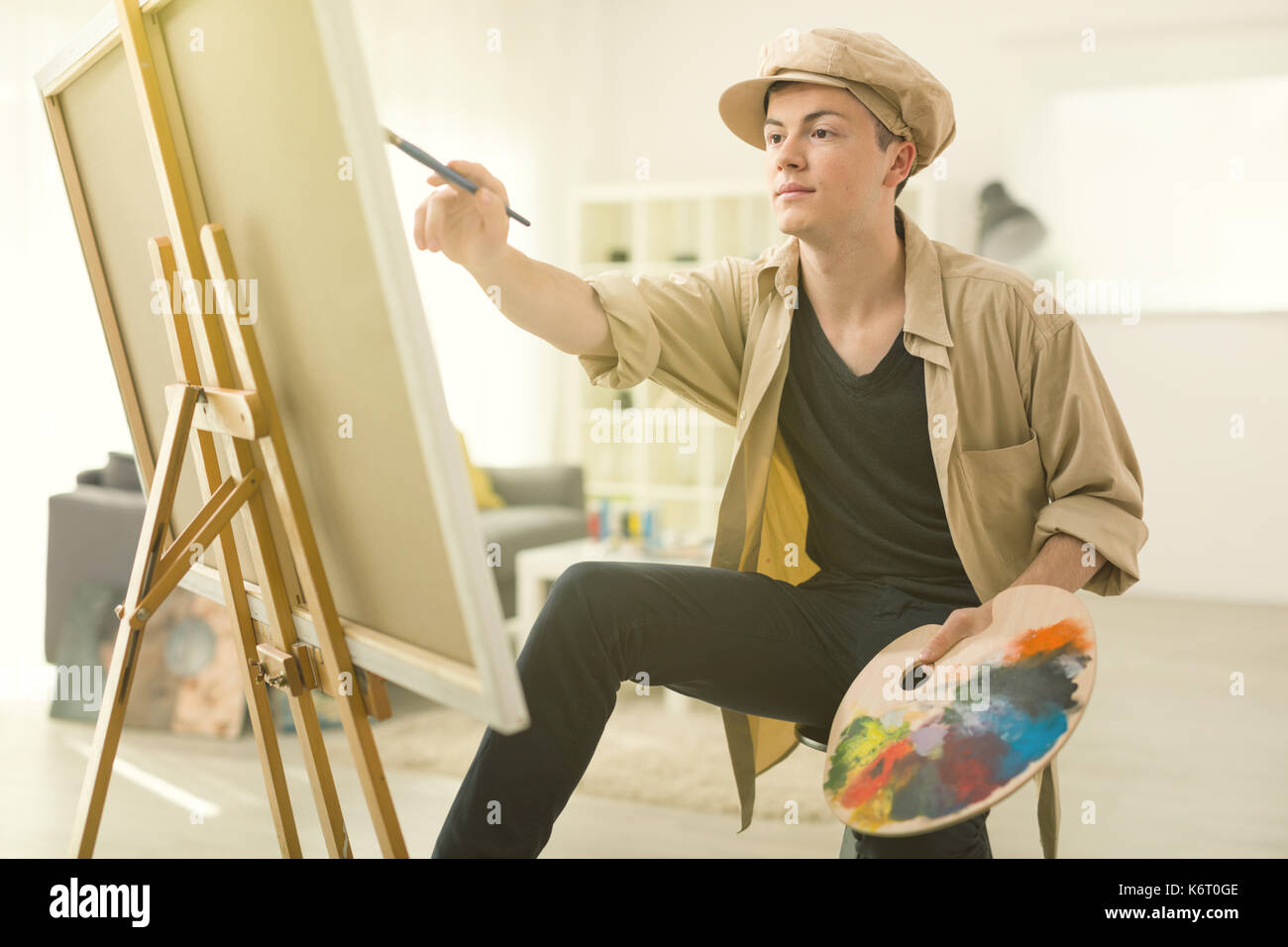 Male teenager painting artist hi-res stock photography and images - Alamy