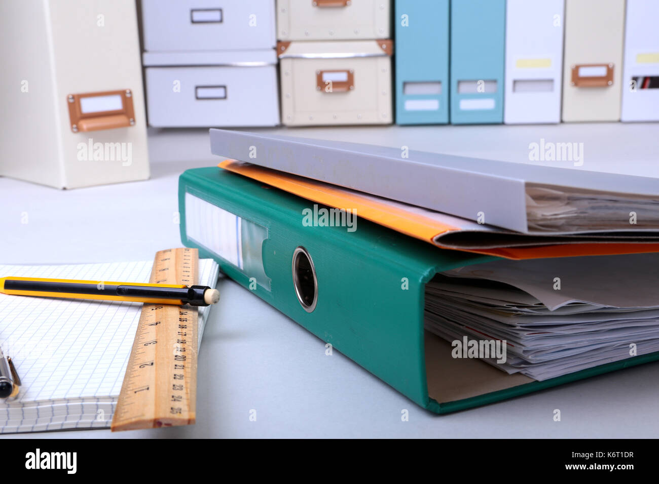 Folder file, note and pen on the desk. blurred background Stock Photo ...
