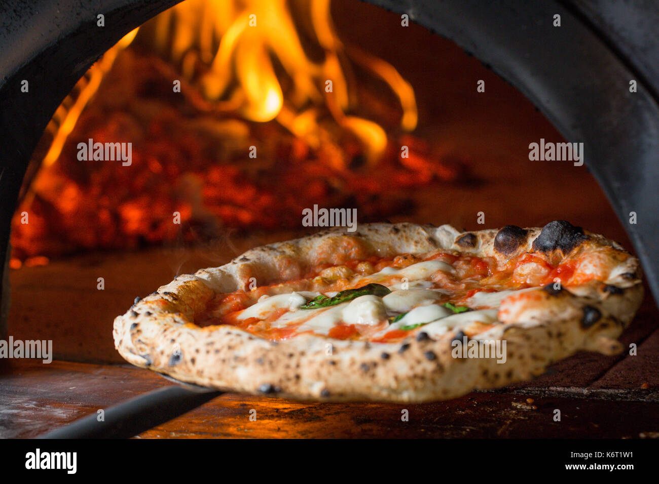 baked tasty margerita pizza near oven Stock Photo Alamy