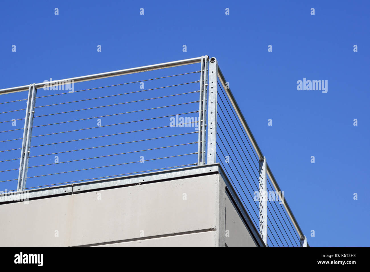 Balcony with white parapet of the blue sky Stock Photo