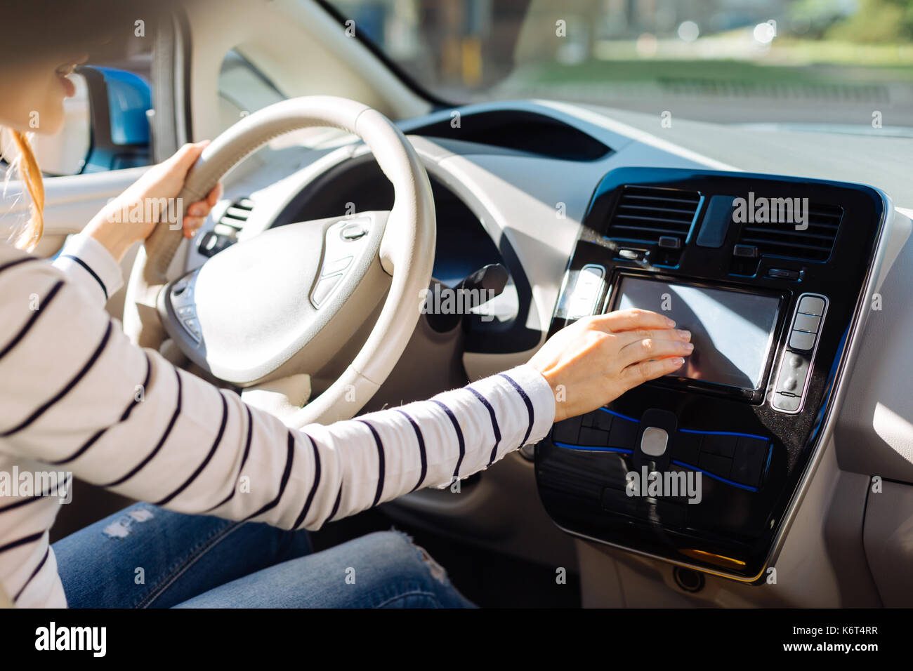 Woman at electronic control panel hi-res stock photography and images ...
