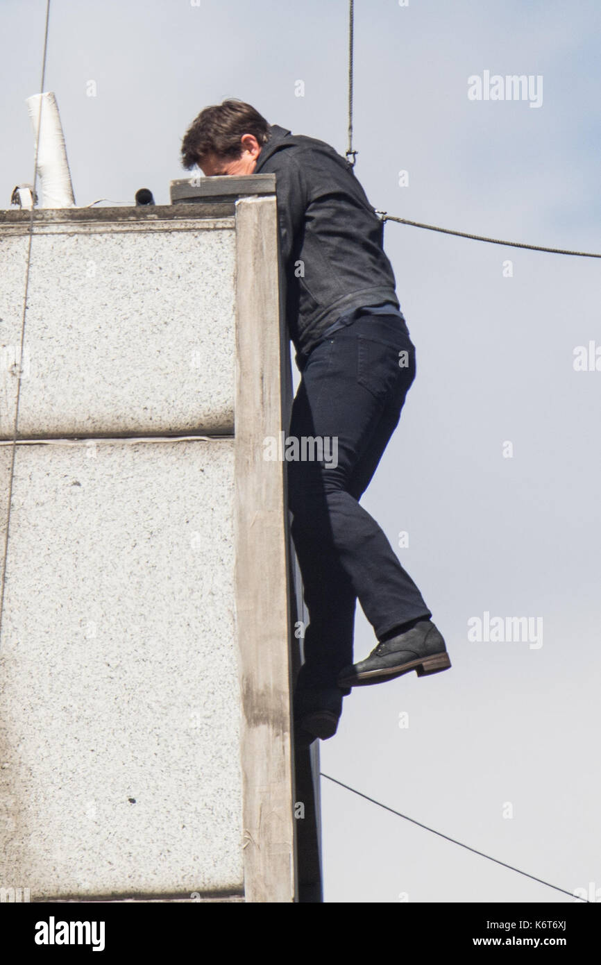 ​Tom Cruise leaps from the roof of one building to another while filming the next film in the 'Mission: Impossible' series; Cruise appeared to injure himself in the stunt and required medical treatment.  The 55-year-old action man was injured during a big building-jump stunt on the set of the blockbuster in London on Sunday (13Aug17) - which was caught on camera. Cruise appeared to miss his mark while jumping from construction rigging onto a nearby building, and slammed gainst the wall. Clambering up the wall and getting to his feet, the movie star limped for a few yards and then collapsed in  Stock Photo