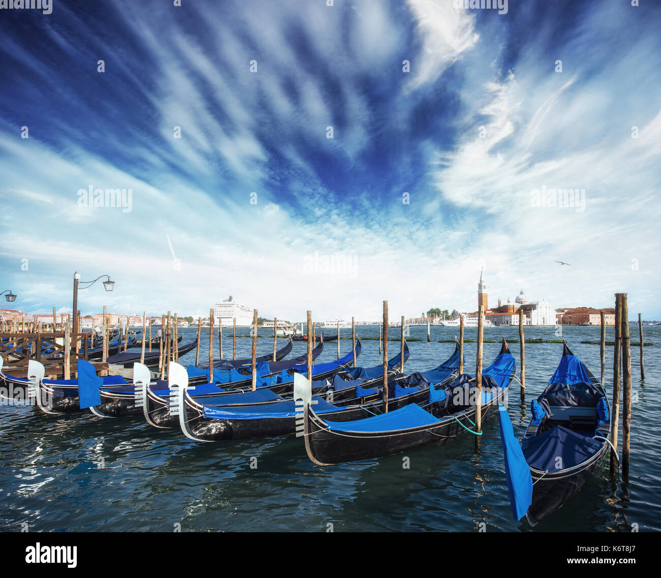 Gondolas on Grand canal in Venice, San Giorgio Maggiore church. San Marco. Beautiful summer landscape Stock Photo