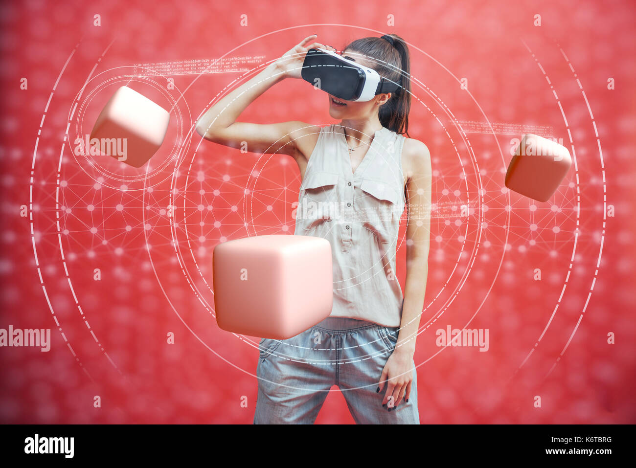 Visual reality concept. Young man using Visual reality or VR headset and interacting with object Stock Photo