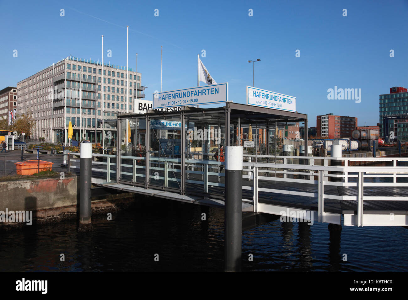 The pedestrian entrance, advertising harbour tours, leading to the footbridge to the Color Line ferry terminal in Kiel Stock Photo