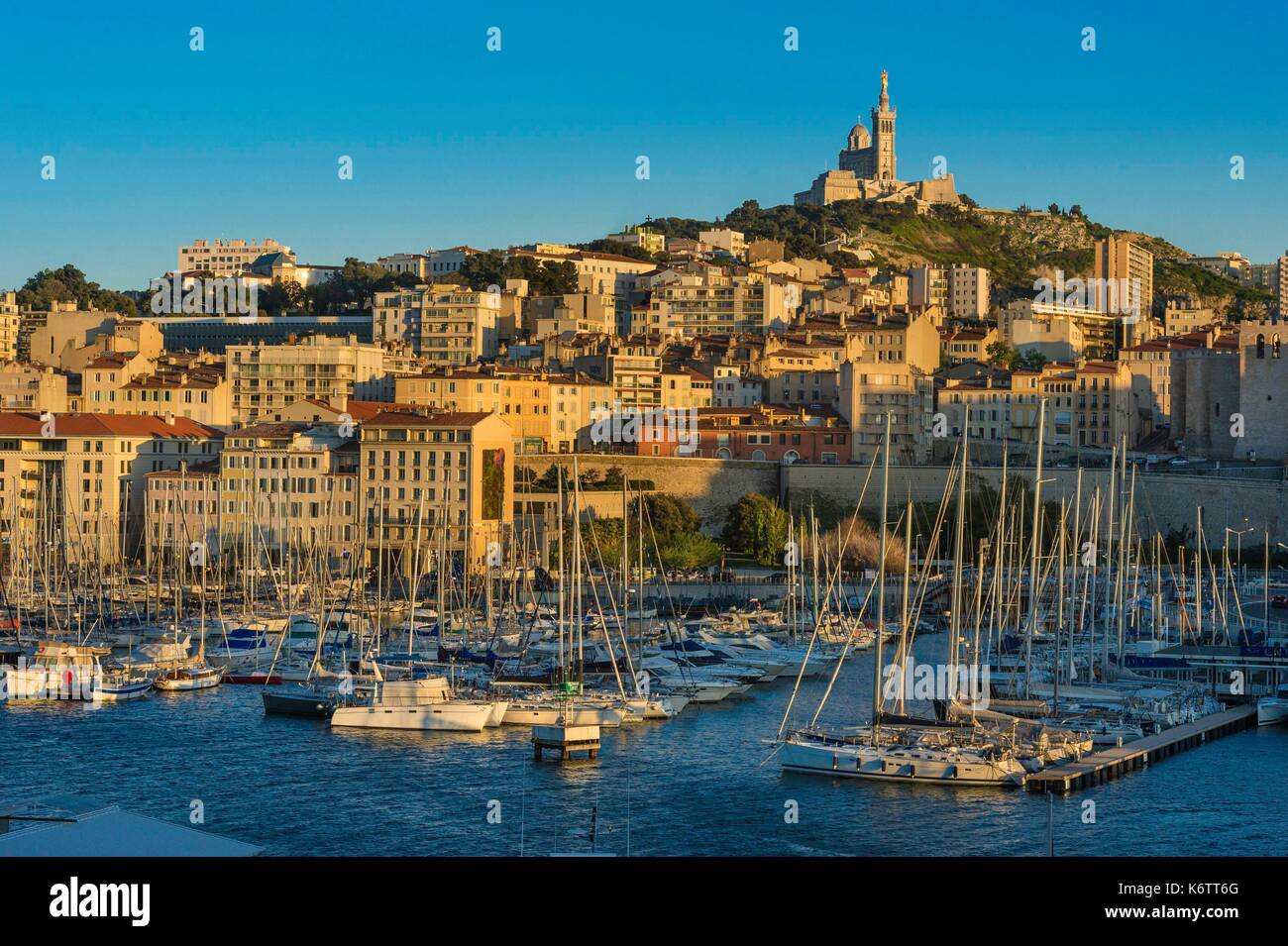 France, Bouches du Rhône, Marseille, Old Port, Rive Neuve wharf, Notre Dame de la Garde basilica in the background Stock Photo