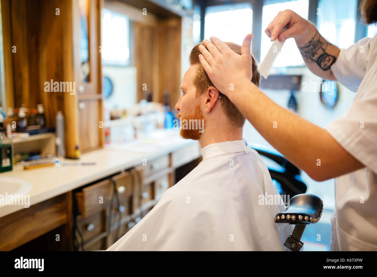 Combing of hair and styling Stock Photo - Alamy