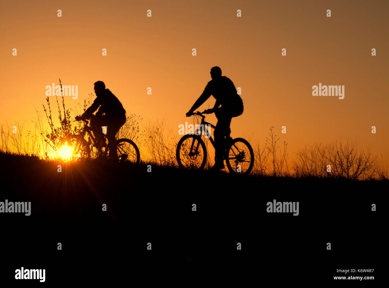 Guys riding bikes Stock Photo Alamy