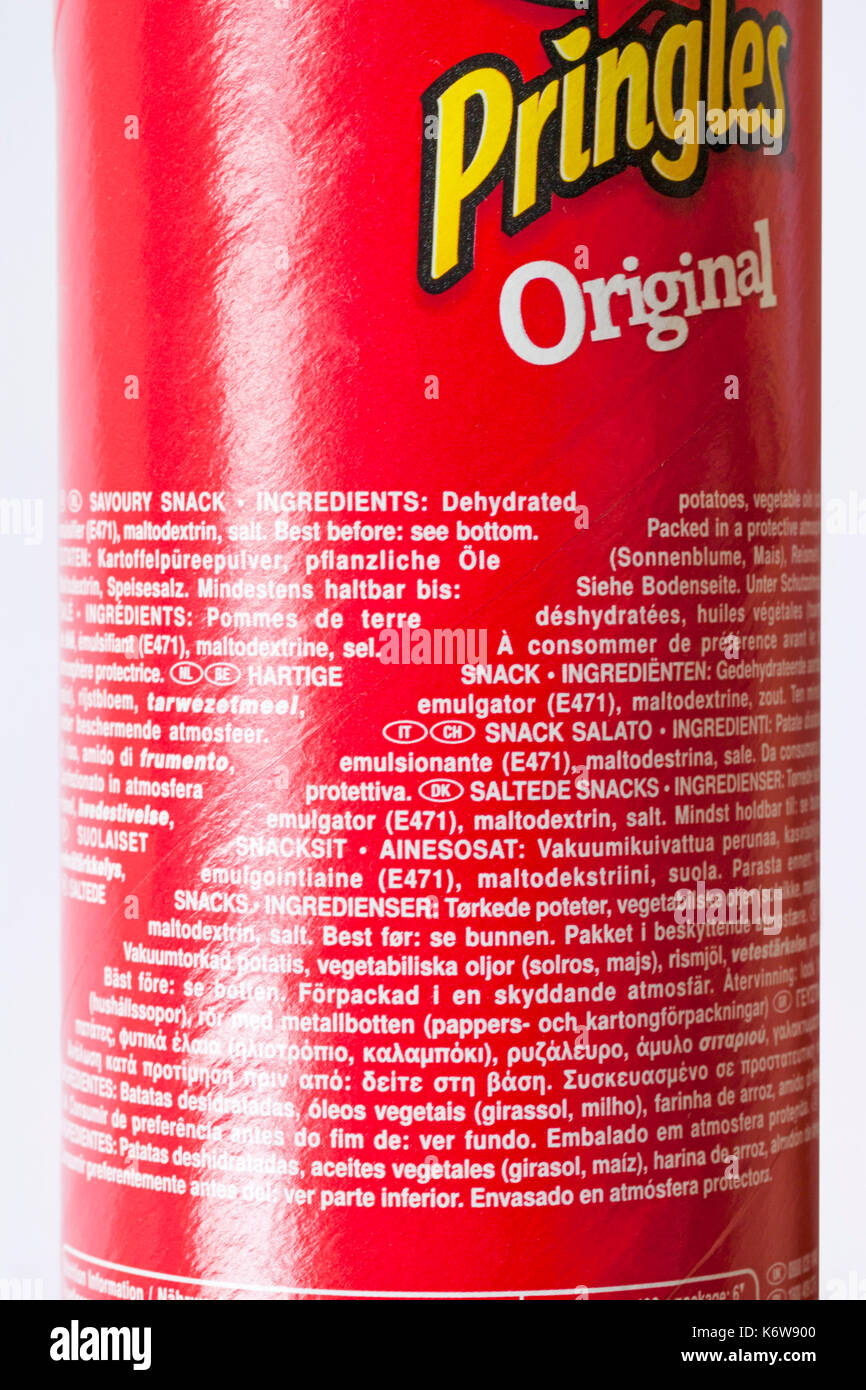 Ingredients and best before information on tub of Pringles Original in many  different languages Stock Photo - Alamy