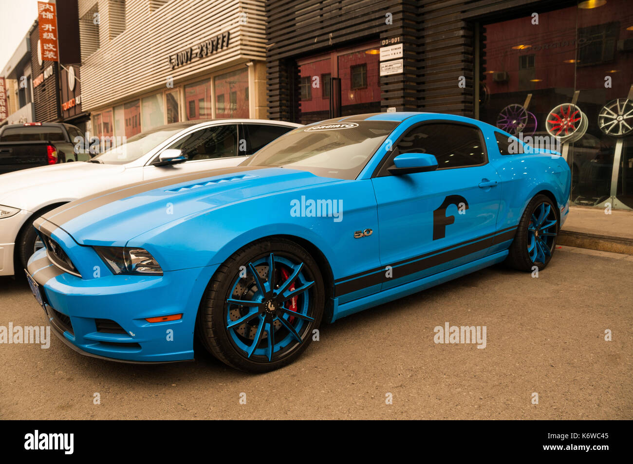 Forgiato wheels modelled by a Ford Mustang on the Beijing Tuning Street. Stock Photo