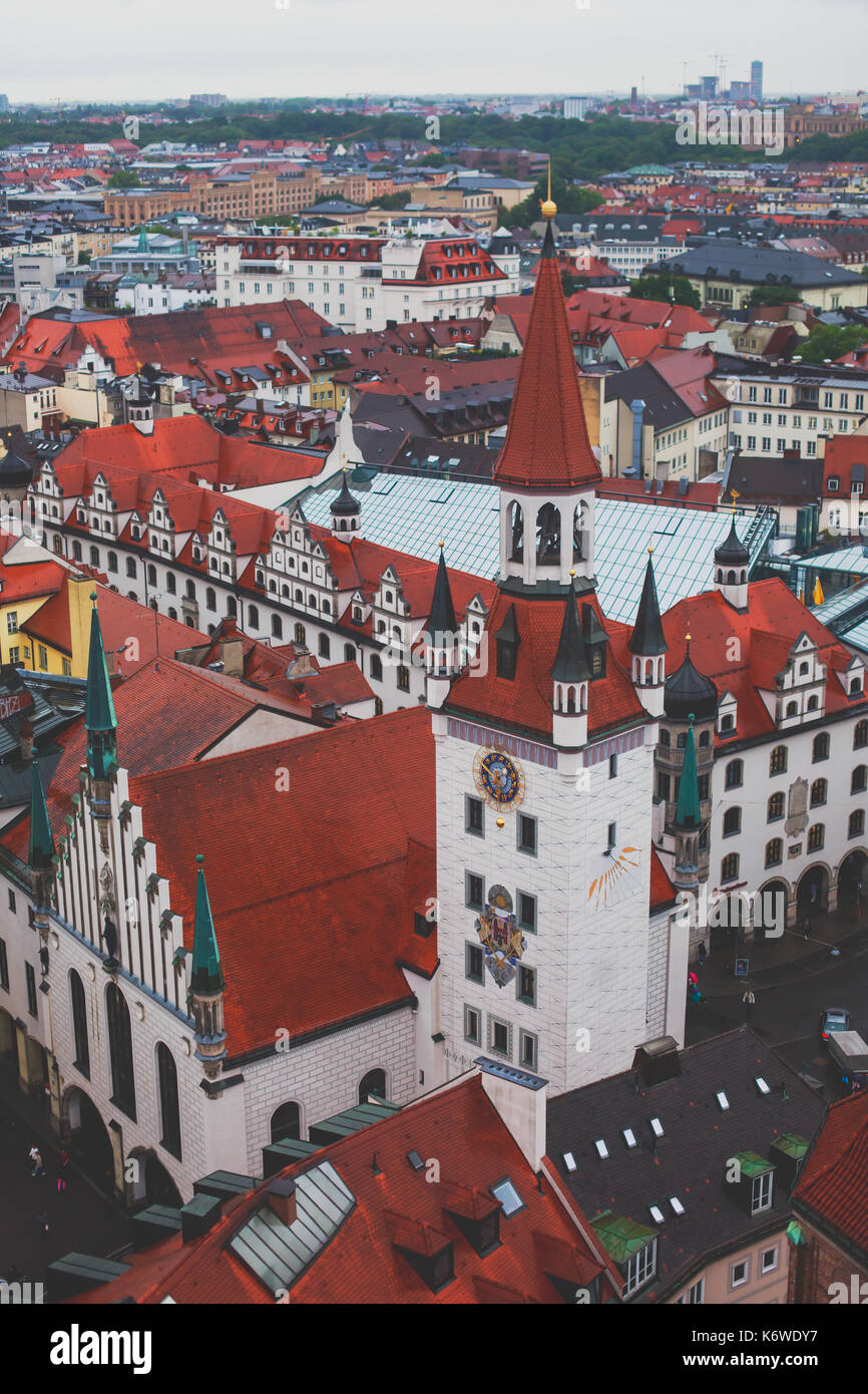 Beautiful super wide-angle sunny aerial view of Munich, Bayern, Bavaria, Germany with skyline and scenery beyond the city, seen from the height Stock Photo