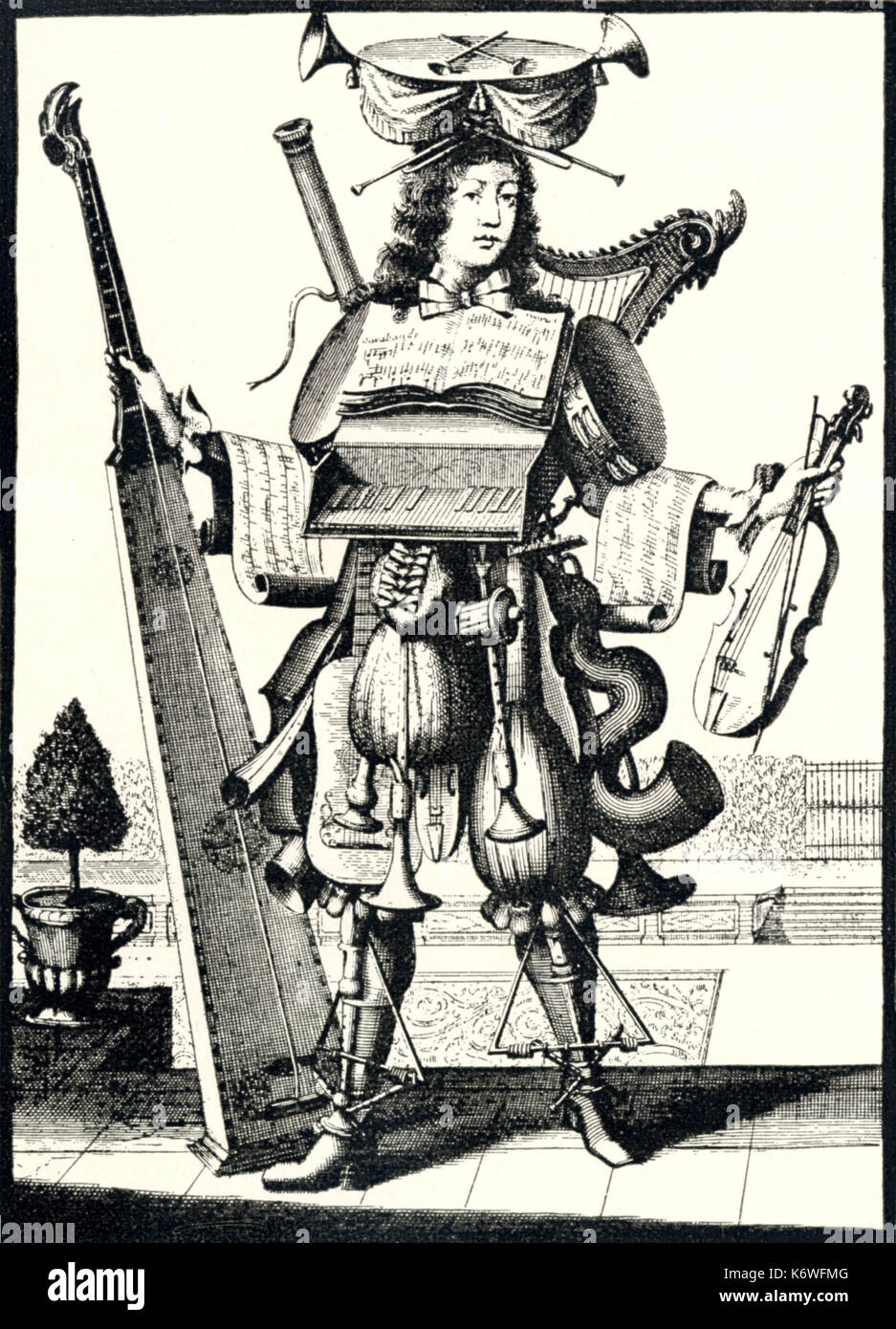 'Habit de Musicien' - Baroque Musician Early Baroque Musician in costume made up from instruments: Serpent; cornet; lute; violin; tromba marina; triangle; pochette; harp; bassoon etc Stock Photo