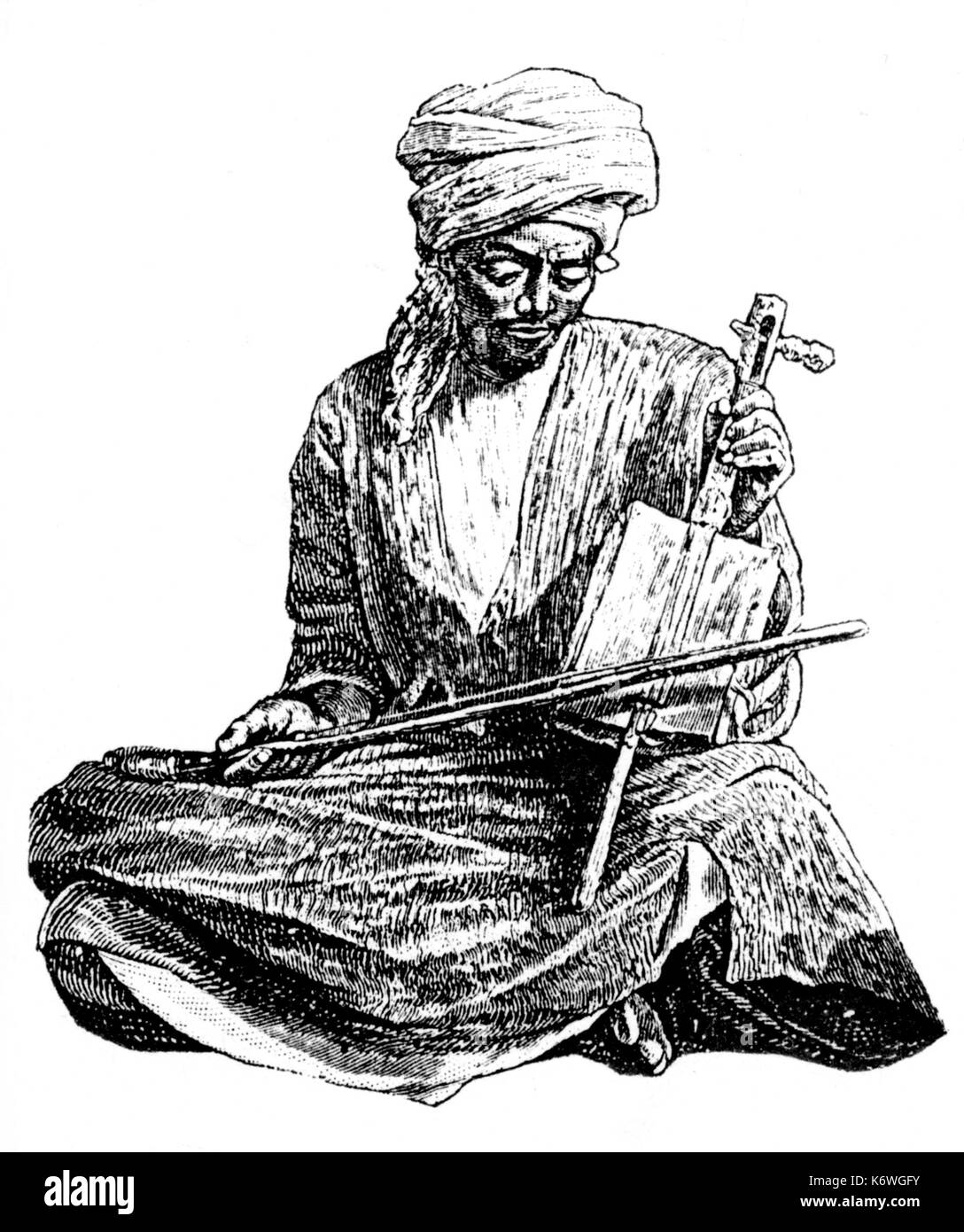 REBAB (Arabia/Persia/Egypt) arab man playing rebab.  ancient bowed instrument Stock Photo