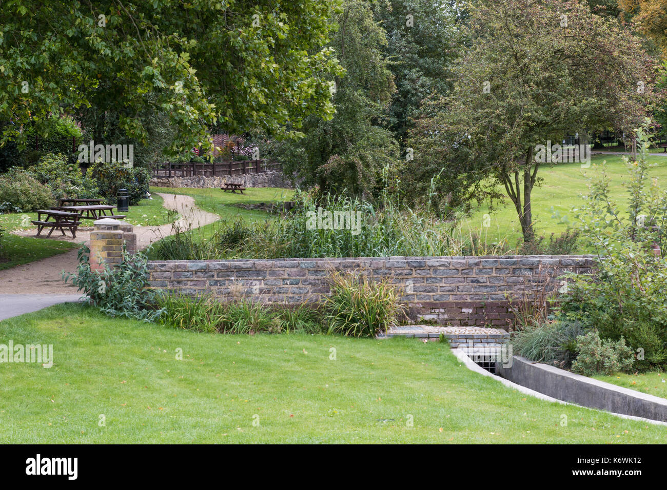 Swadlincote Park Derbyshire  water and stone feature. water chanel, rock feature with stone and pebble inlays. Stock Photo