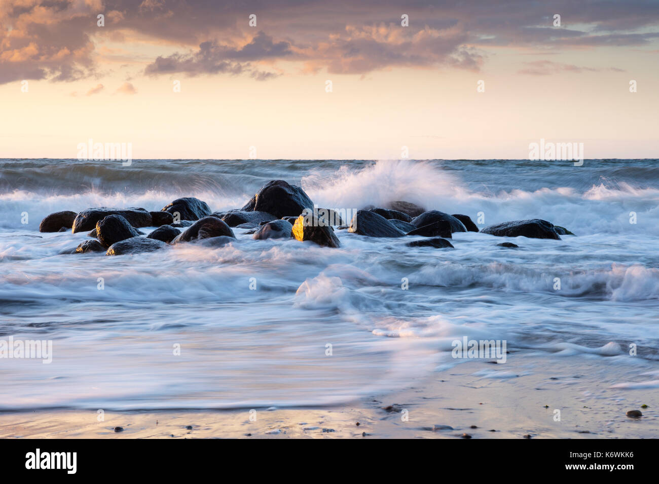 Waves and rocks on the Baltic Sea coast, Kühlungsborn, Mecklenburg-Western Pomerania, Germany Stock Photo