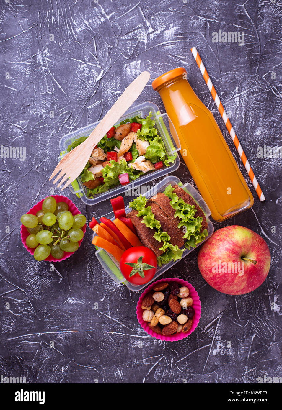 School lunch. Salad, sandwiches, fruits and nuts Stock Photo Alamy