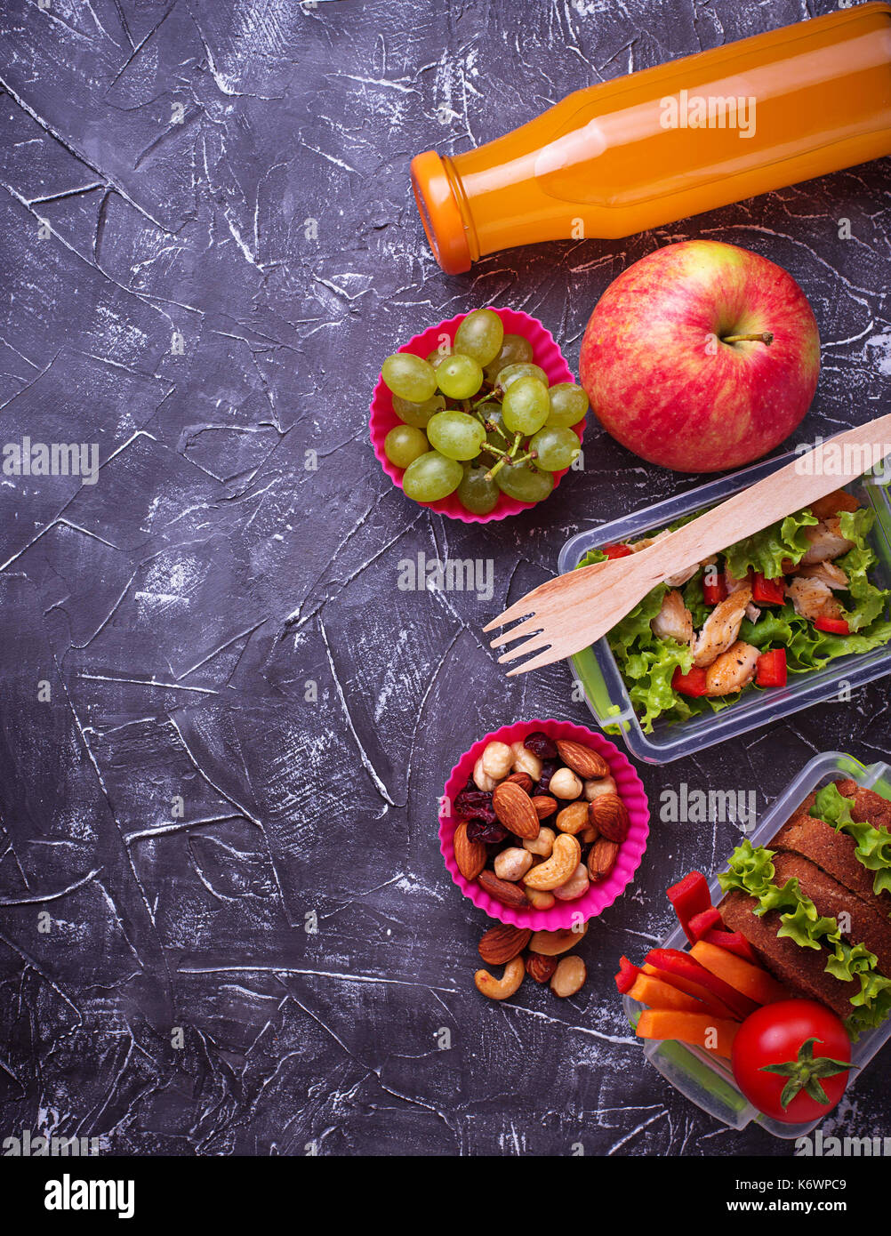 School lunch. Salad, sandwiches, fruits and nuts Stock Photo Alamy