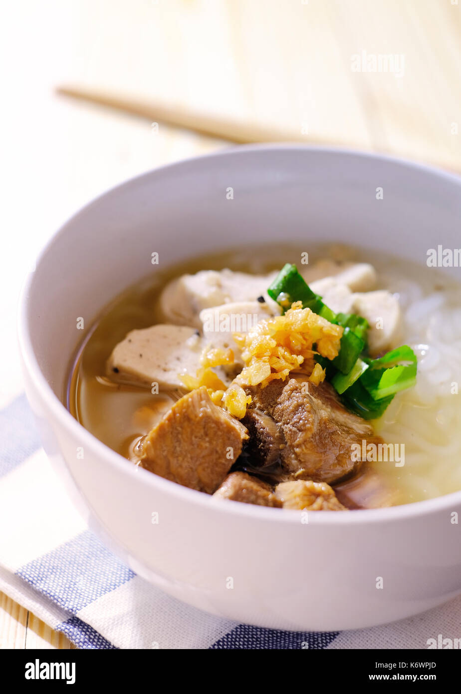 white pork sausage with noodle in soup, asian style Stock Photo