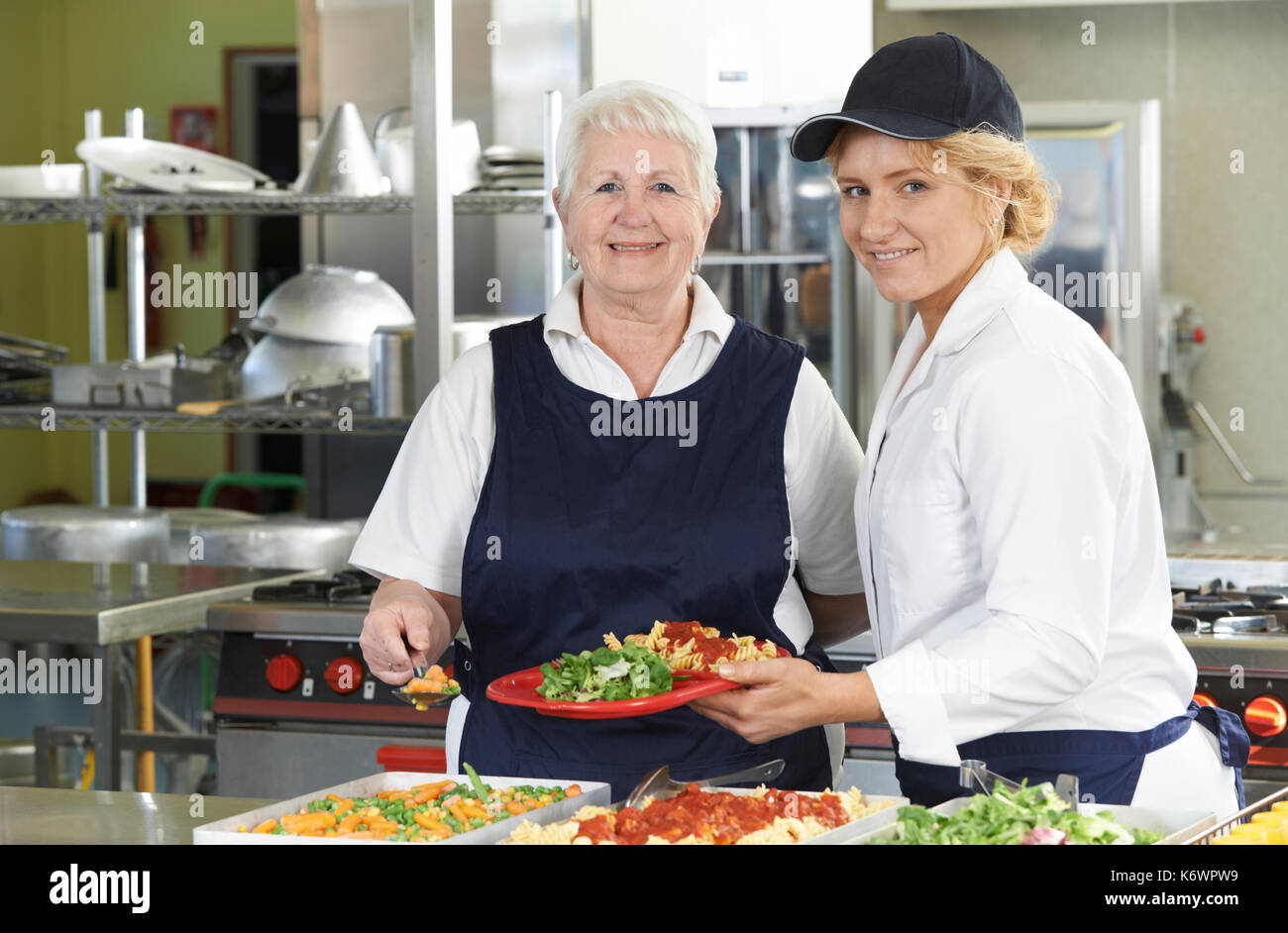Cafeteria woman uniform school hires stock photography and images Alamy