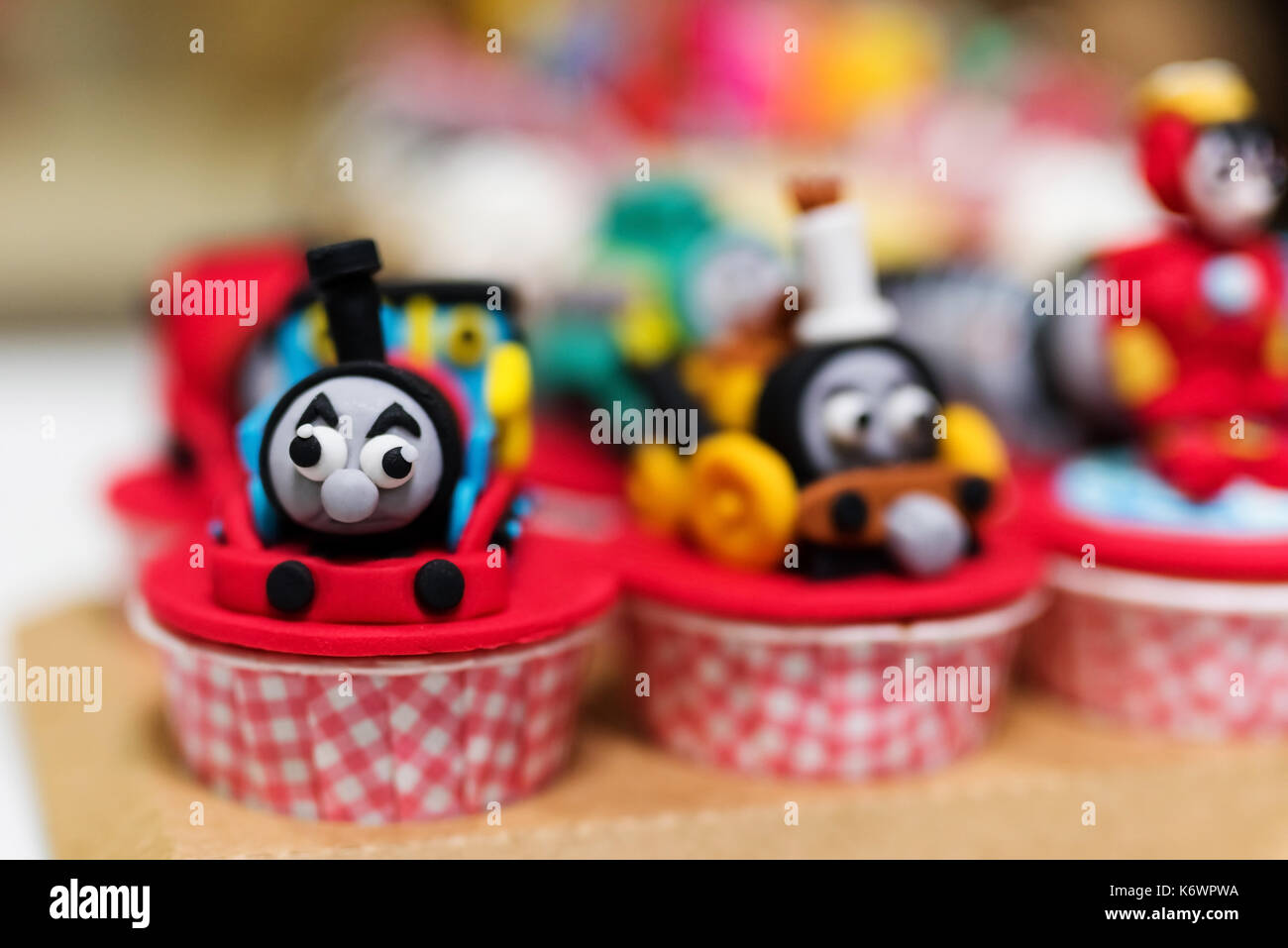 Beautiful handmade cupcake with famous Thomas train model for kid birthday celebration Stock Photo