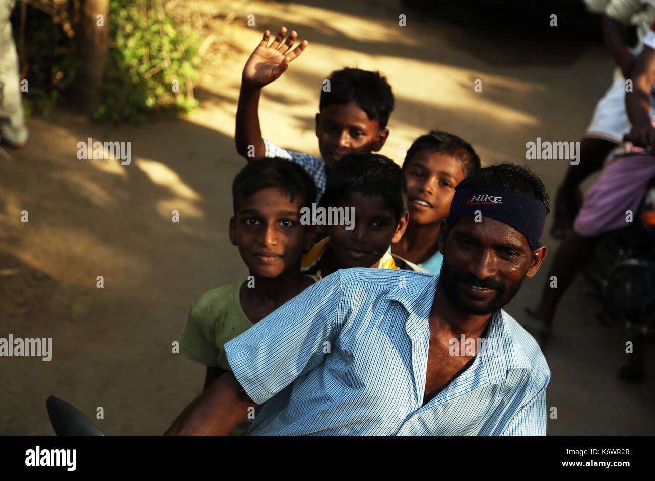Indian family rides a motorbike Stock Photo - Alamy