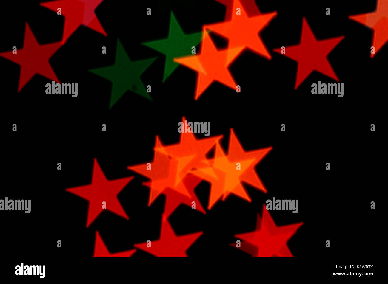 Colorful stars pattern abstract blur on black background. Stock Photo