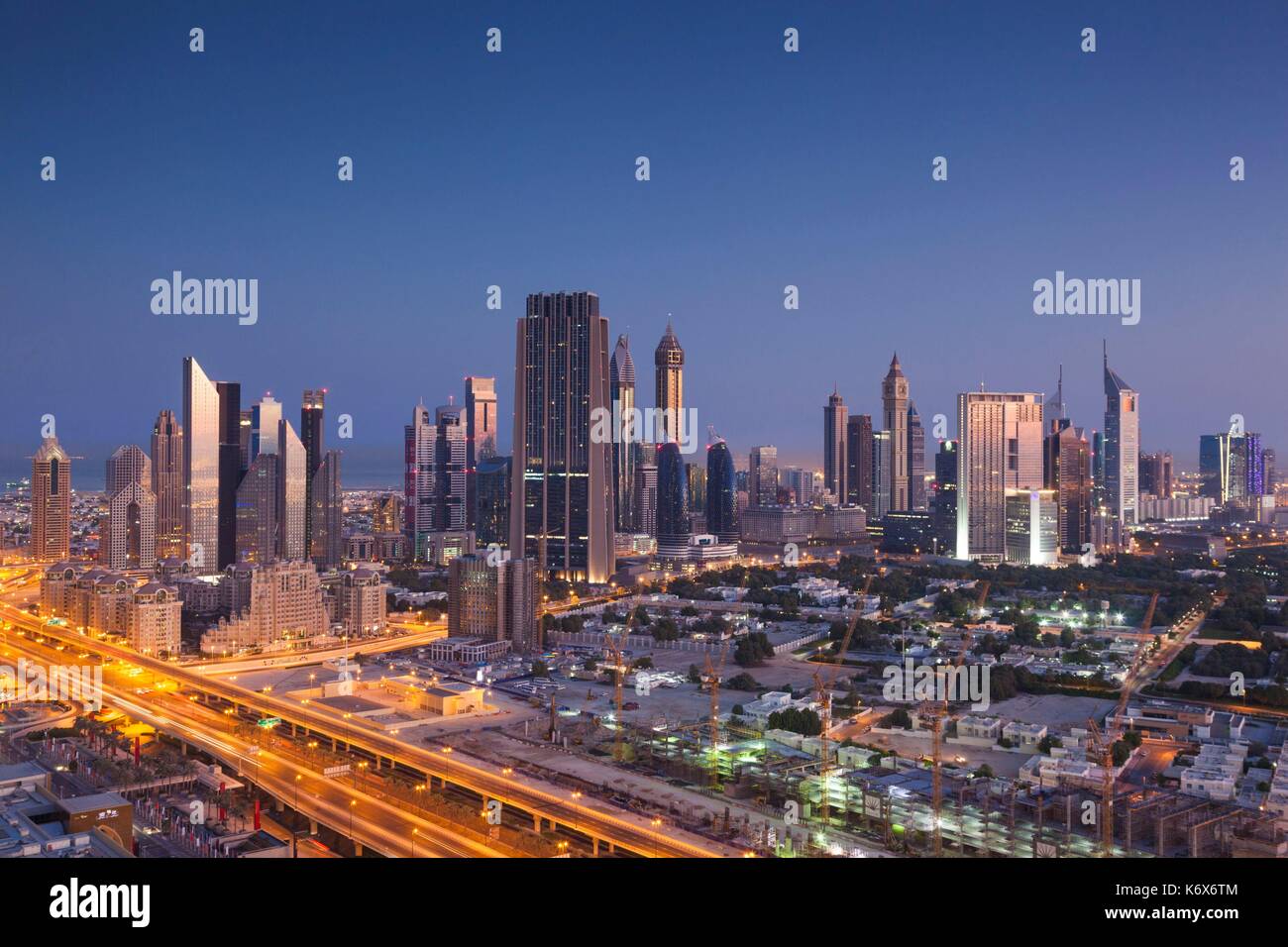 United Arab Emirates, Dubai, Downtown Dubai, elevated view of skyscrapers on Sheikh Zayed Road from downtown, dawn Stock Photo