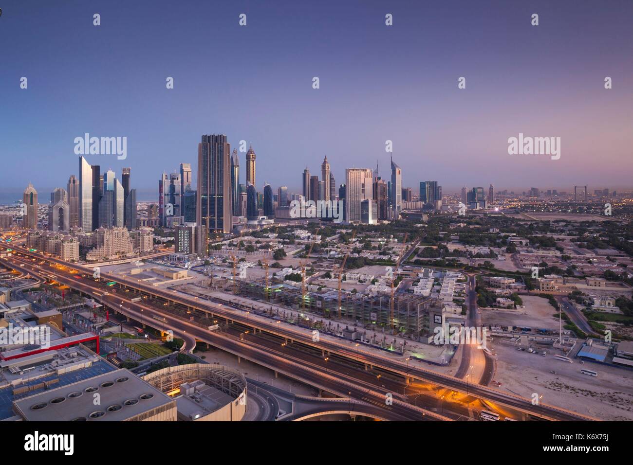 United Arab Emirates, Dubai, Downtown Dubai, elevated view of skyscrapers on Sheikh Zayed Road from downtown, dawn Stock Photo