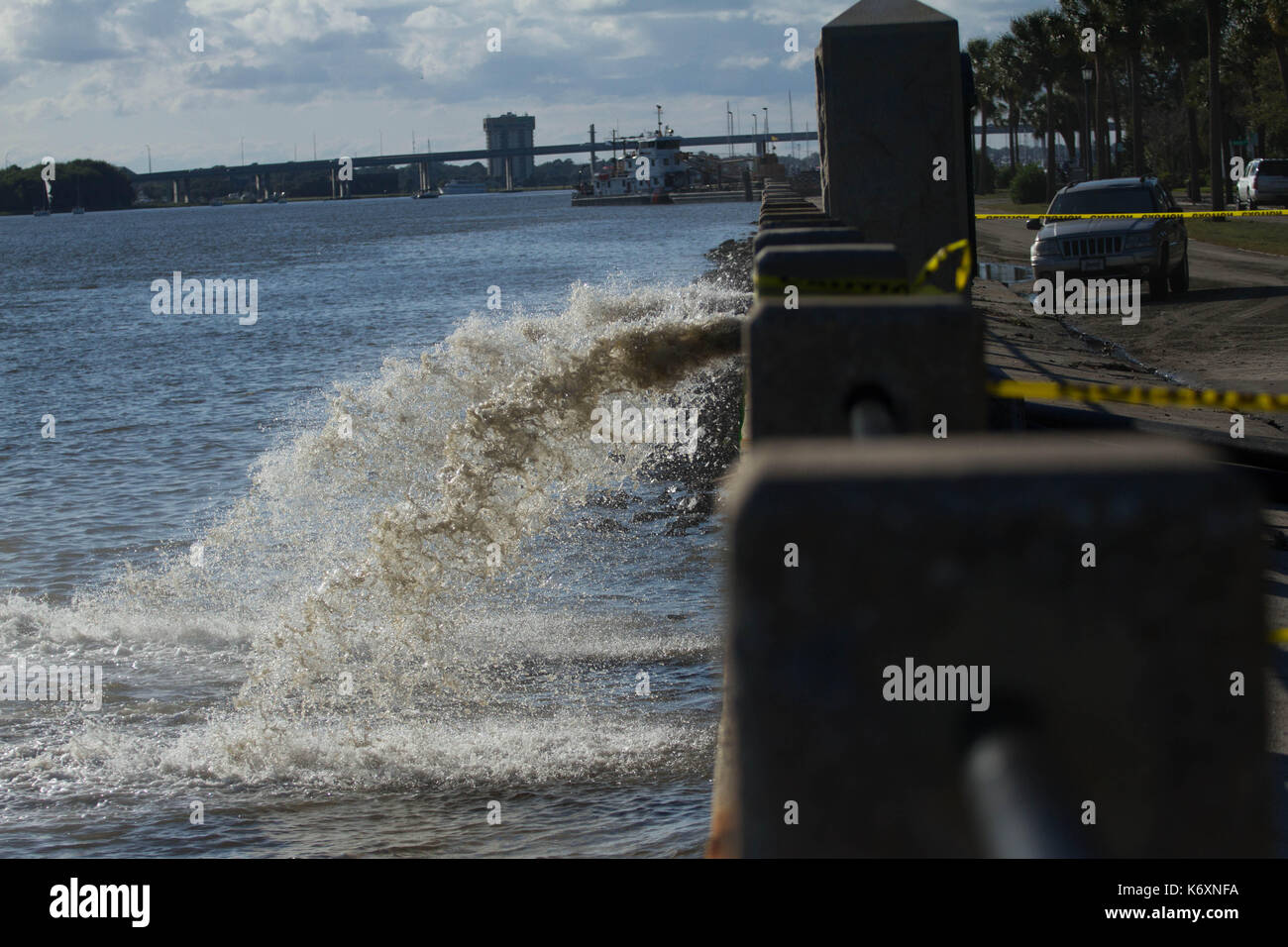 Crews pump water from the street and overwhelmed drainage system in