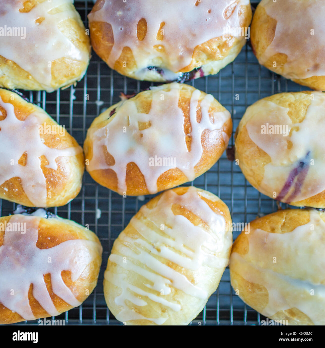 Fresh baked buns filled with blueberry jam Stock Photo Alamy