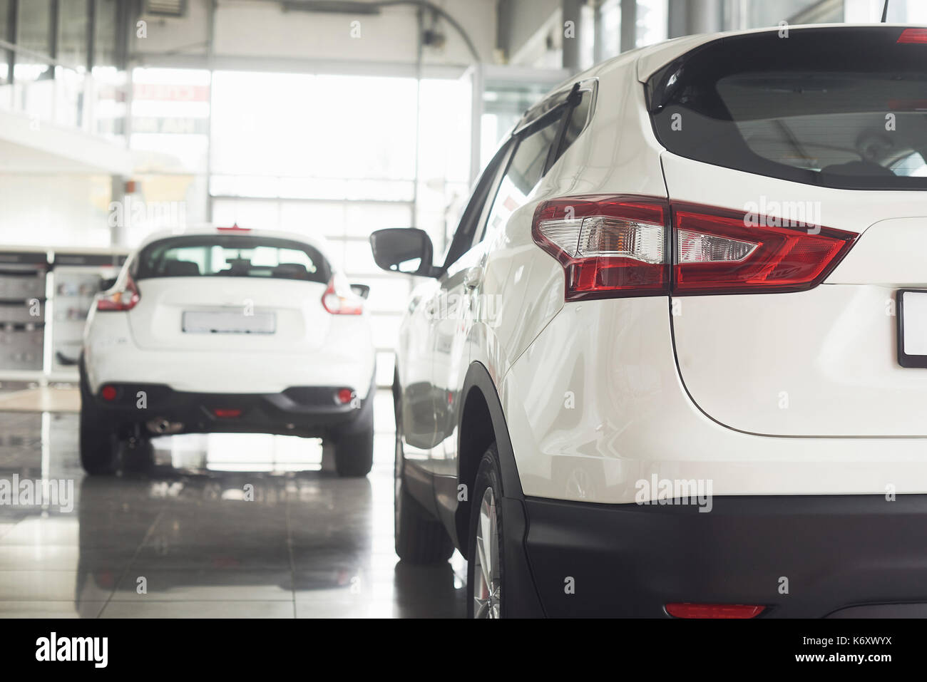 Rear view of luxury a car in salon Stock Photo - Alamy