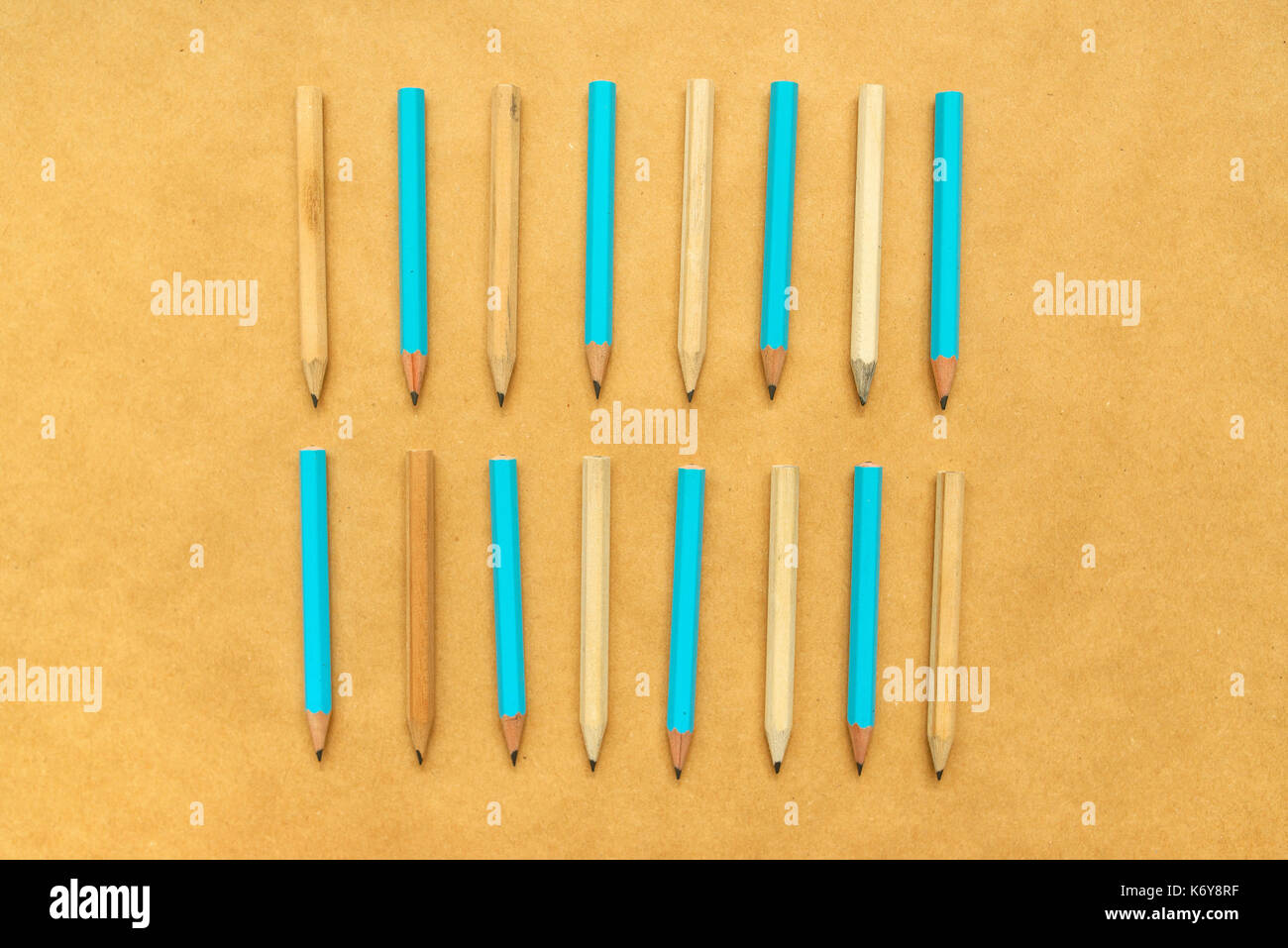 Pencils aligned in flat lay, top view - abstract pattern background for ideas, creativity, writing and education Stock Photo