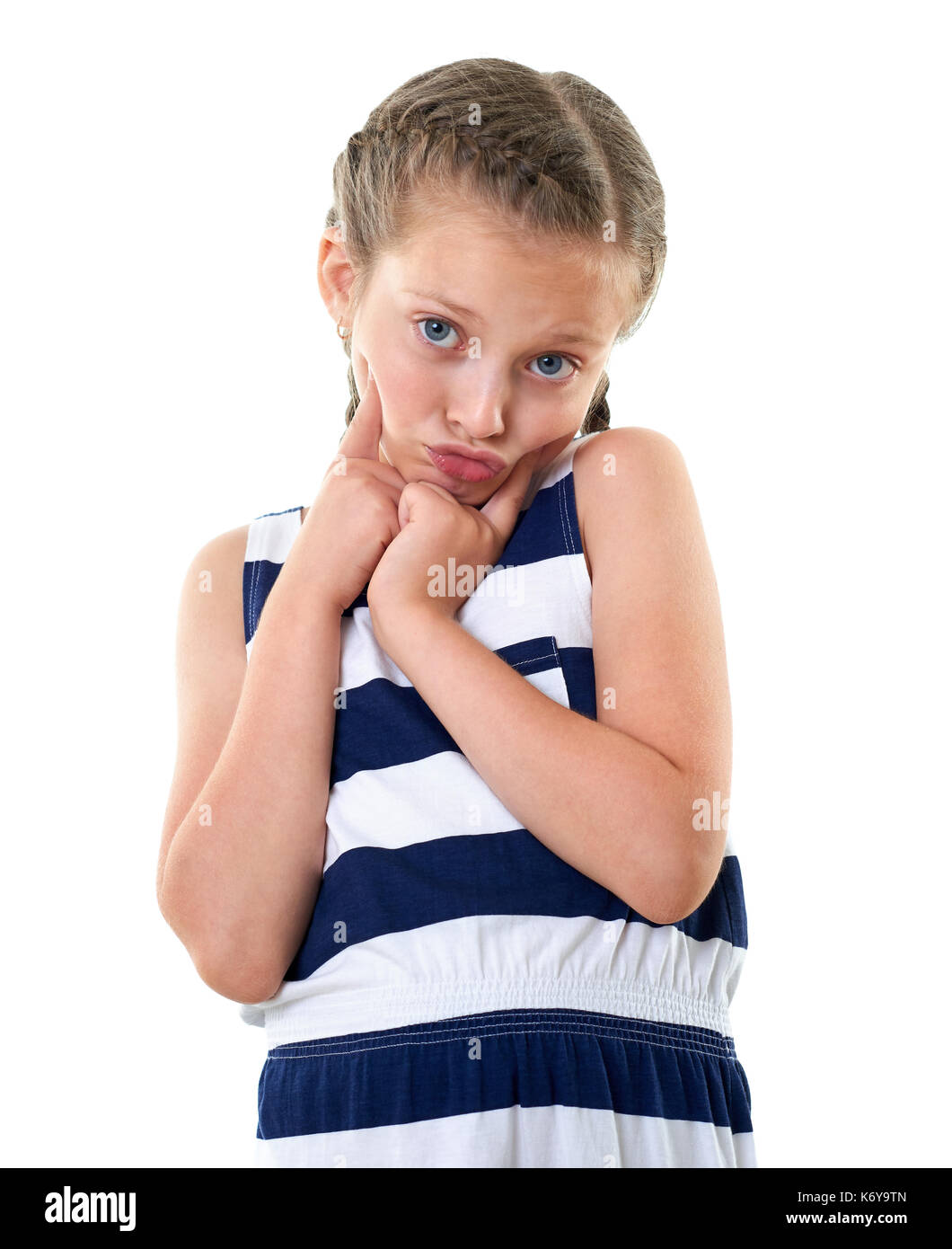 pretty-little-girl-in-striped-dress-studio-portrait-making-a-surprised