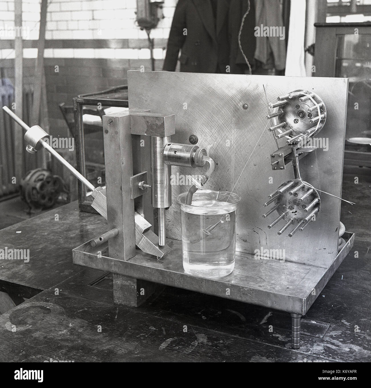 1950s, historical picture shows the chemistry apparatus used at the time for undertaking research into the amount of dye absorption by fibres, Leeds University, England. Stock Photo