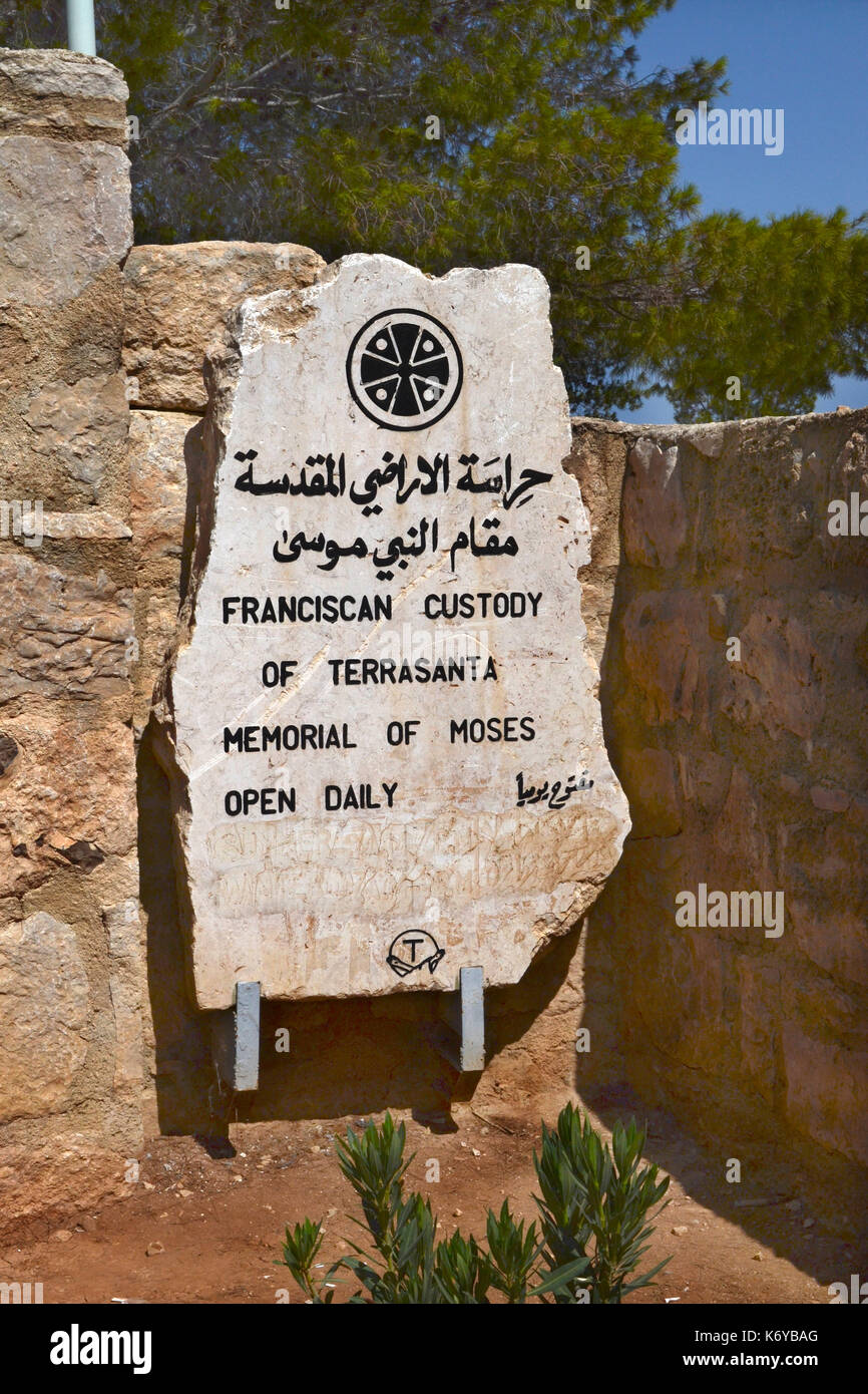 MOUNT NEBO, JORDAN - JULY 22, 2015: Sign for the Memorial of Moses on Mount Nebo. A Christian Holy Place, thought to be the place Moses was given a vi Stock Photo